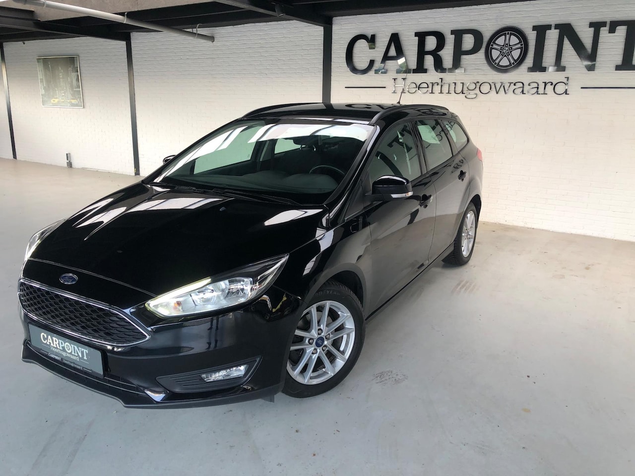 Ford Focus Wagon - 1.0 Titanium Edition 2015 125PK Navi Cruise Led Stuurverwarming Parkpilot Clima - AutoWereld.nl
