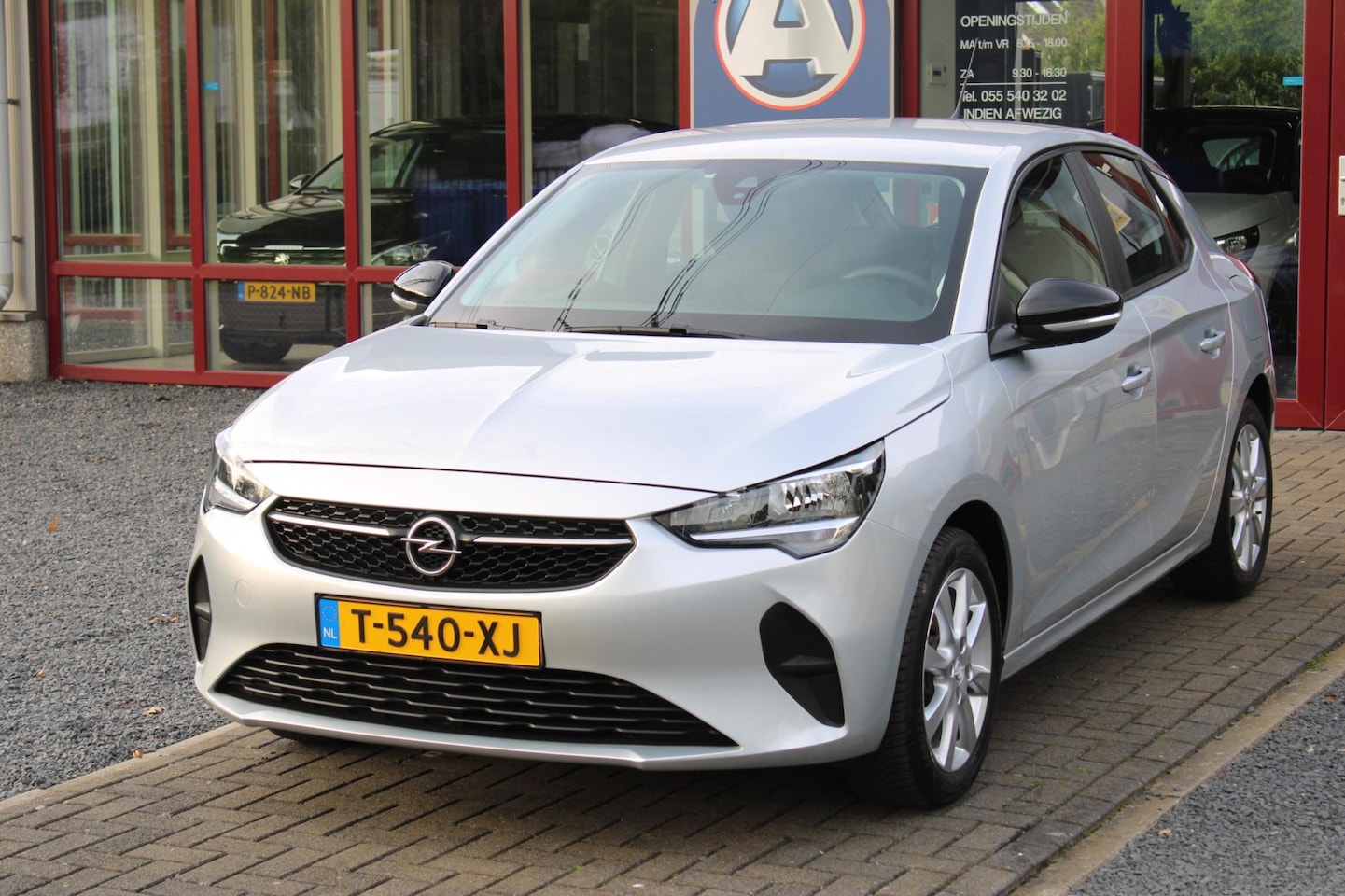 Opel Corsa - 1.2 Edition NAVI AIRCO LMV v.a. 135.- p/m - AutoWereld.nl