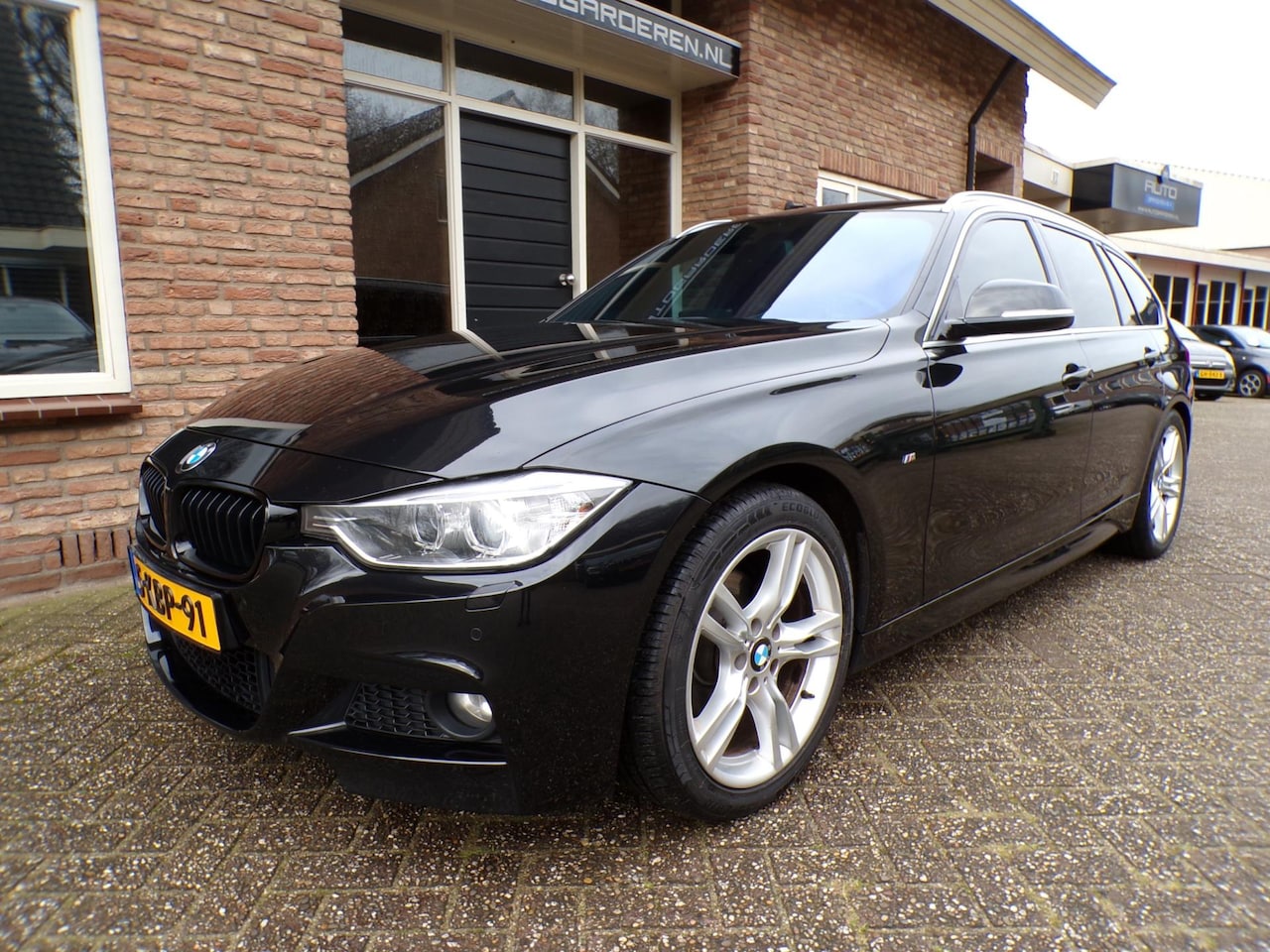 BMW 3-serie Touring - 320i High Executive Automaat / leder / Navi / Head Up / M Pakket - AutoWereld.nl