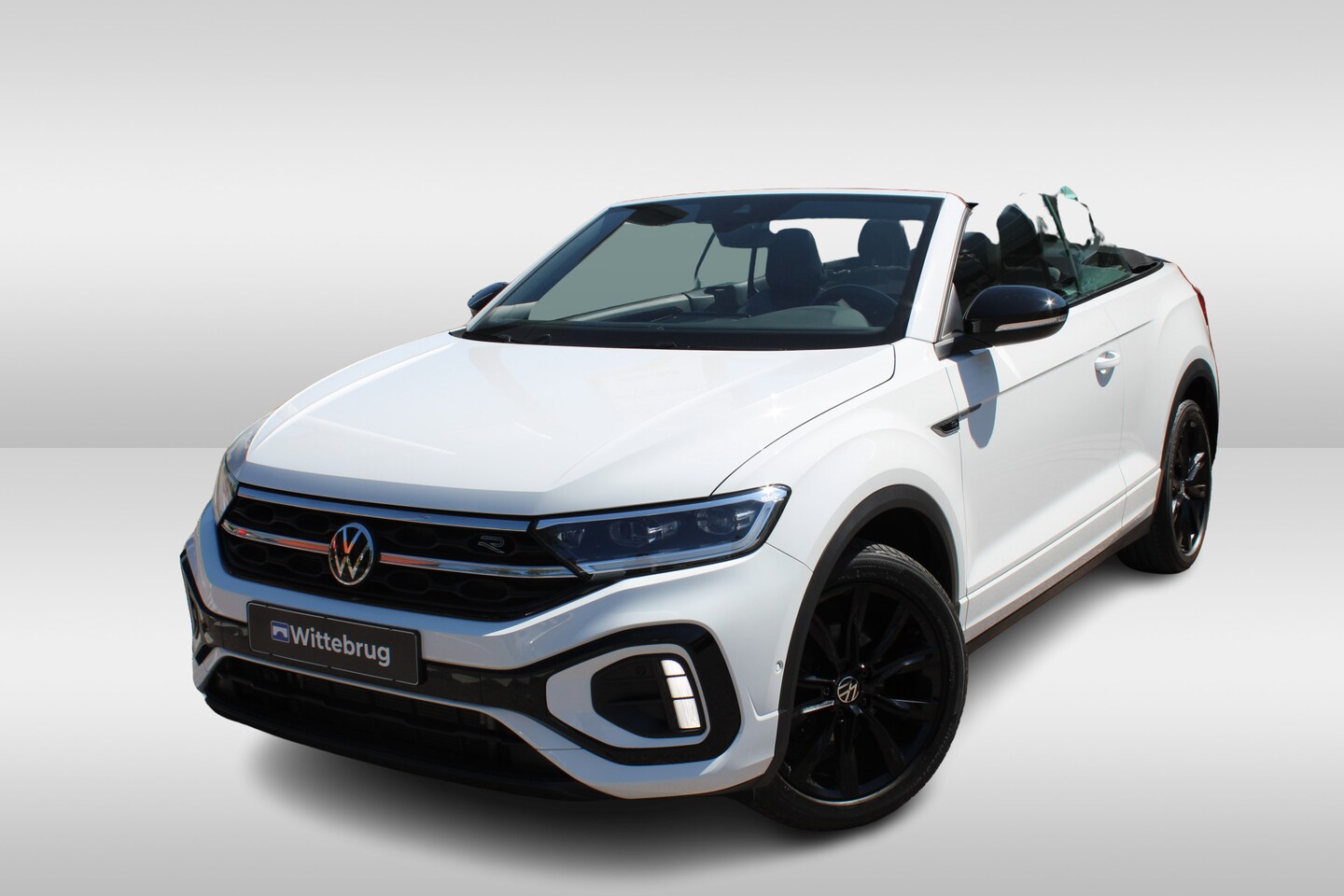 Volkswagen T-Roc Cabrio - 1.5 TSI 150pk R-Line DSG Automaat Black Style / Navigatie / Afn Trekhaak / Camera / LM 18 - AutoWereld.nl