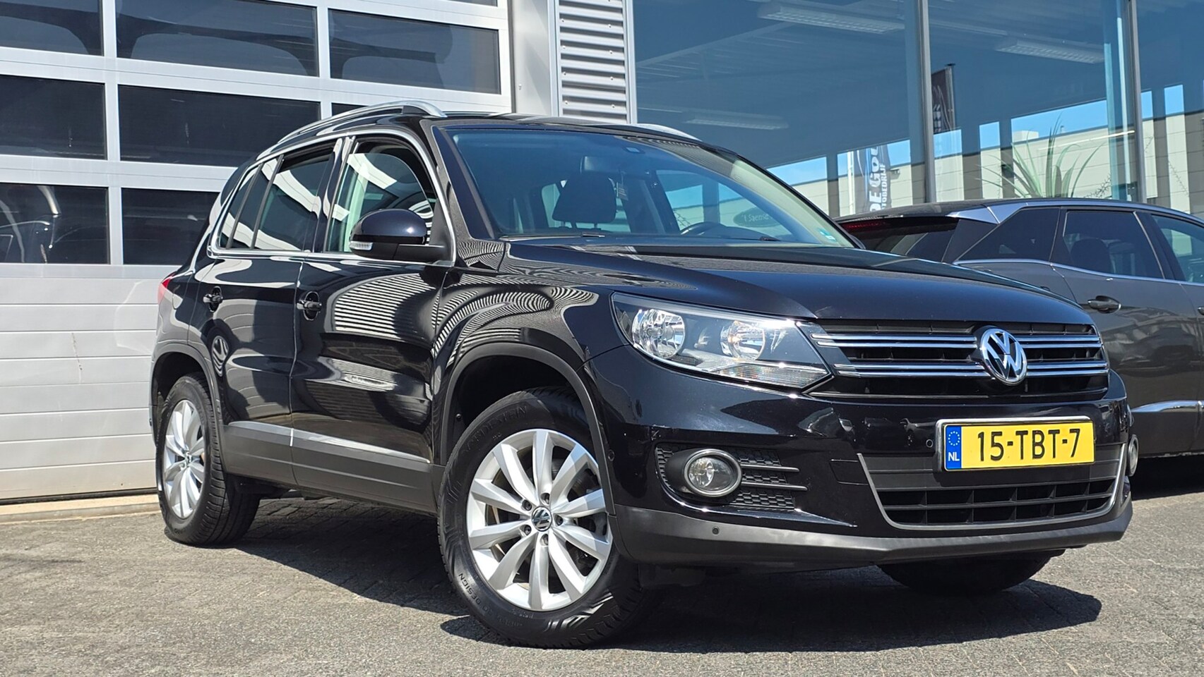 Volkswagen Tiguan - 1.4 TSI Sport&Style - AutoWereld.nl