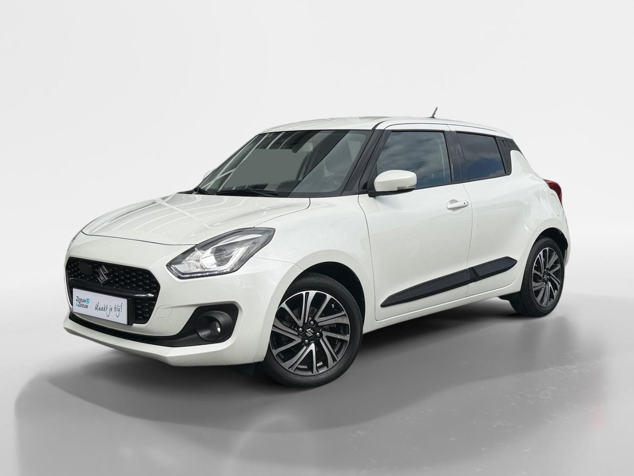 Suzuki Swift - 1.2 Style Smart Hybrid | Adapt Cruise Control / Climate Control | Stoelverwarming | Camera - AutoWereld.nl