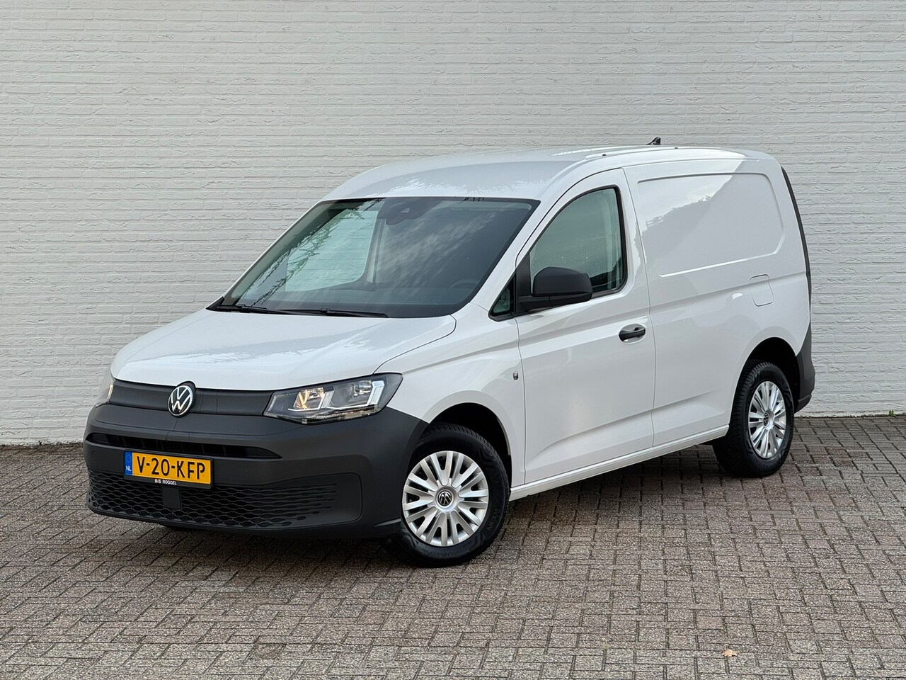 Volkswagen Caddy Cargo - 2.0 TDI Trend Airco Cruise Pdc Lat om Lat + houten laadvloer - AutoWereld.nl