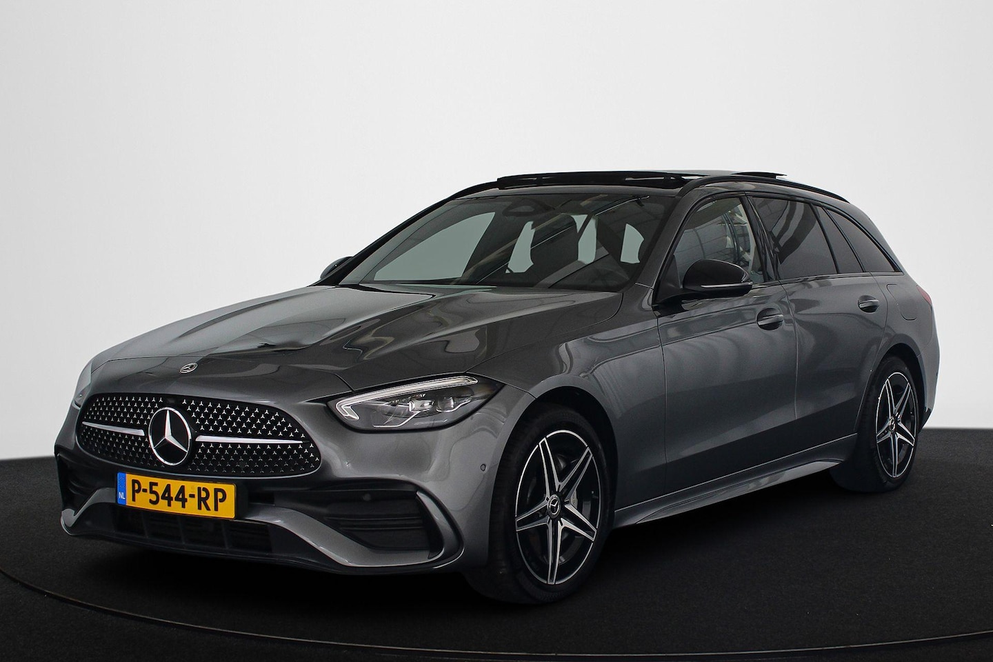 Mercedes-Benz C-klasse Estate - 300 e AMG Line Night Pano Sfeerverlichting Stoelverwarming - AutoWereld.nl