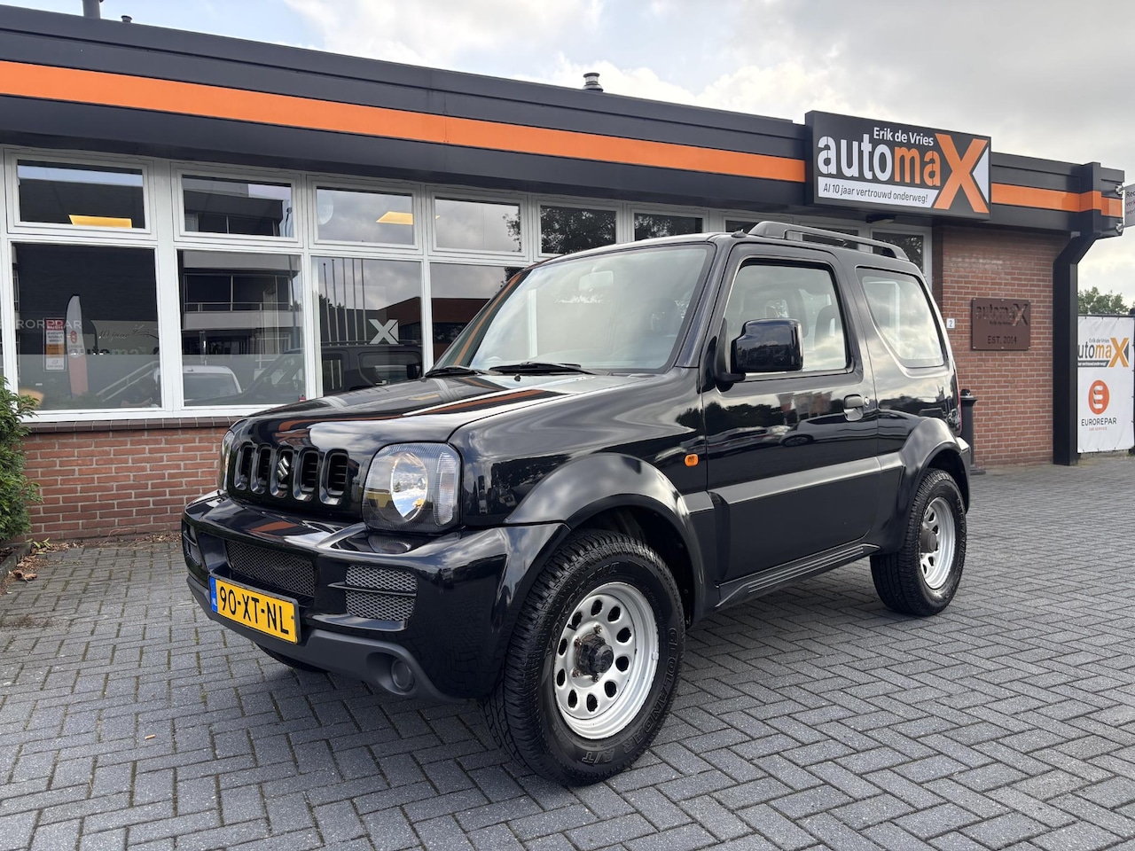 Suzuki Jimny - 1.3 JLX |4WD| - AutoWereld.nl