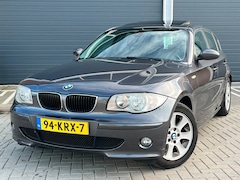 BMW 1-serie - 120i Anniversary KOOPJE AUTOMAAT 120i SCHUIFDAK RIJD SCHAKELT GOED CLIMA IJSKOUD