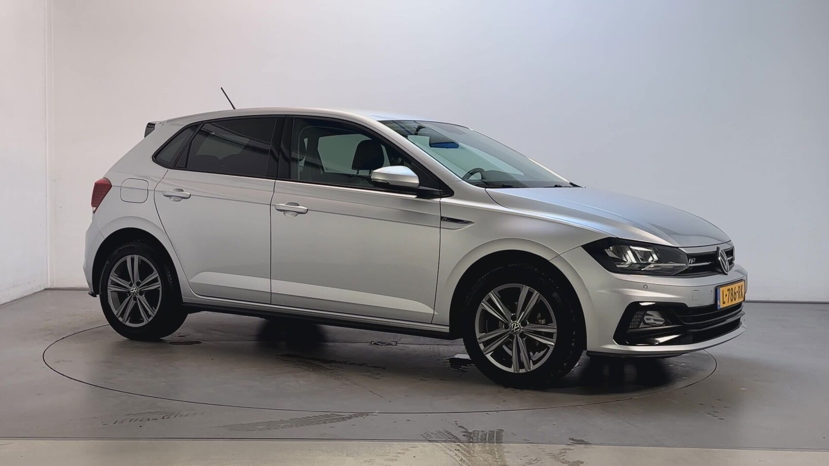 Volkswagen Polo - 1.0 TSI R-Line Edition Navigatie Parkeersensoren App-Connect DAB+ - AutoWereld.nl