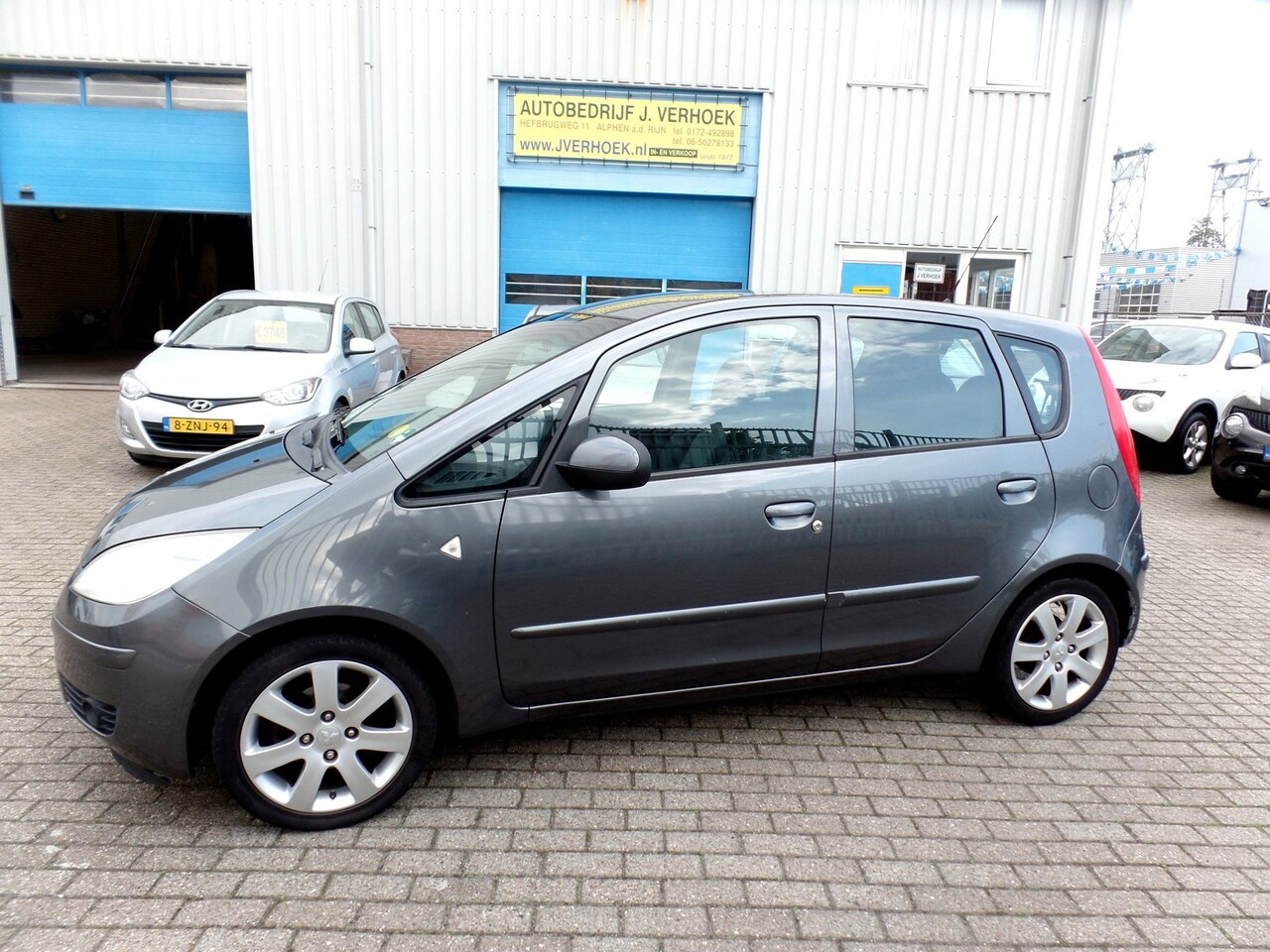 Mitsubishi Colt - 1.3 Invite airco apk 09 08 2027 - AutoWereld.nl