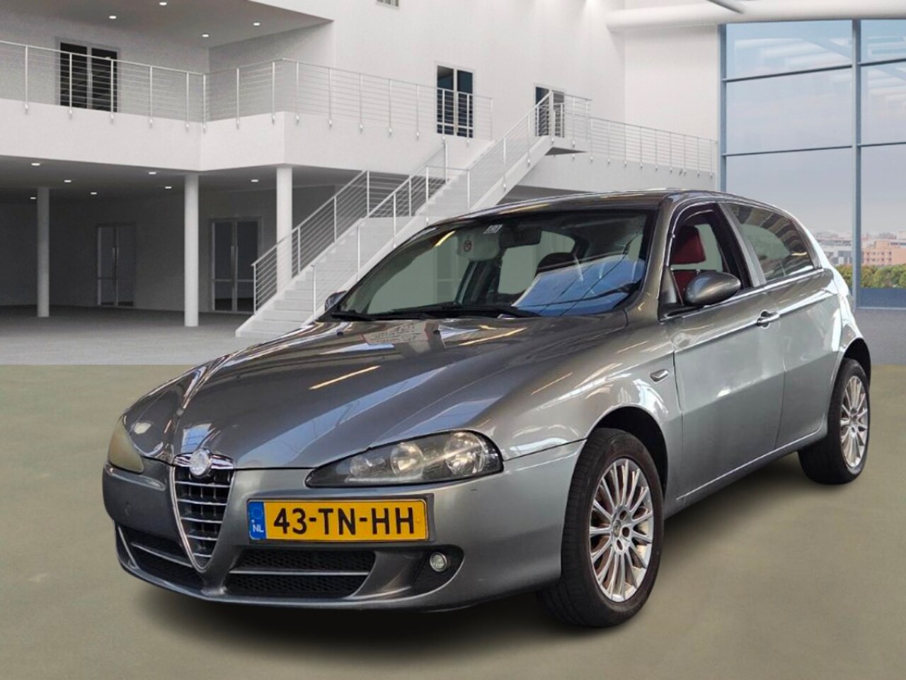 Alfa Romeo 147 - 1.6 T.Spark Progression/AIRCO/CRUISE/LEDER/PARKEERSENS ACHTER - AutoWereld.nl