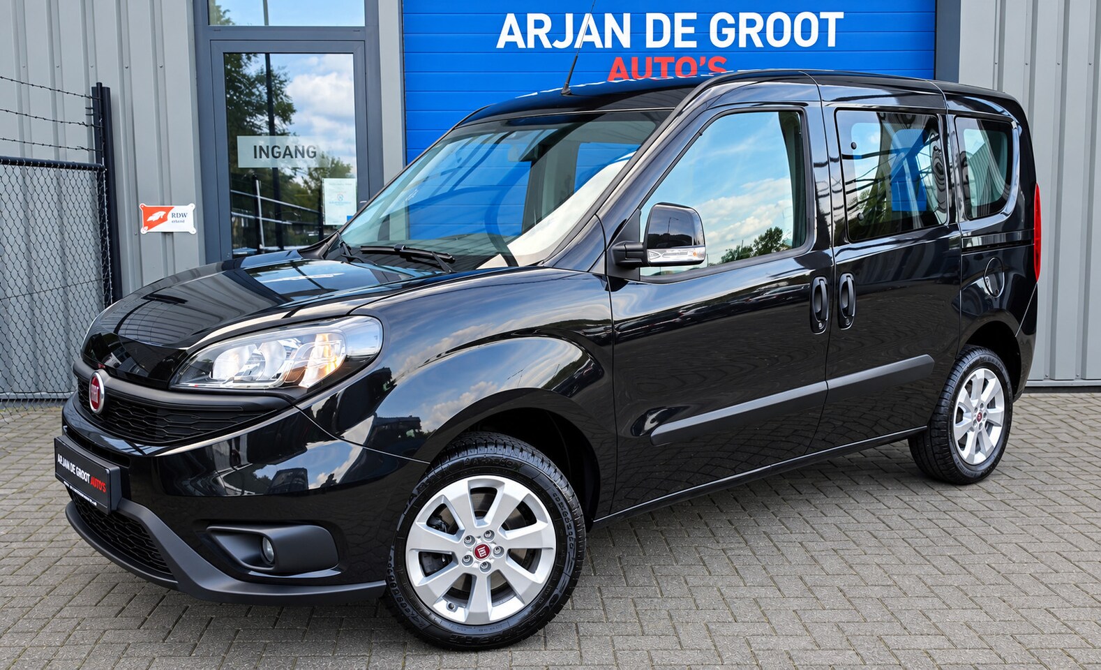 Fiat Doblò Cargo - 1.4 95PK 5 Persoons Airco Navi PDC Bleutooth LM velgen - AutoWereld.nl