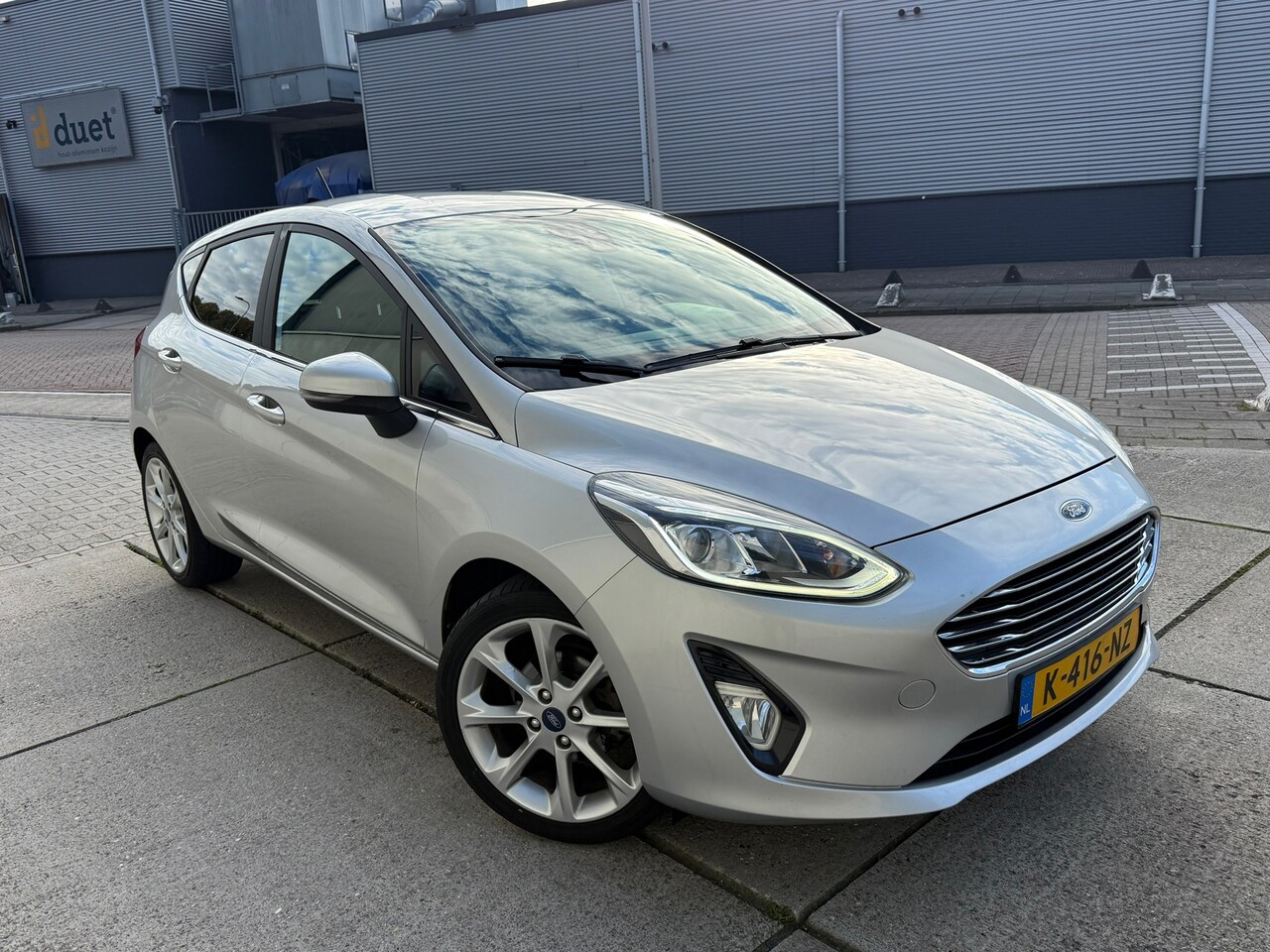 Ford Fiesta - 1.0 EcoBoost Titanium AUTOMAAT Volledig onderhouden Stoelverwarming - AutoWereld.nl