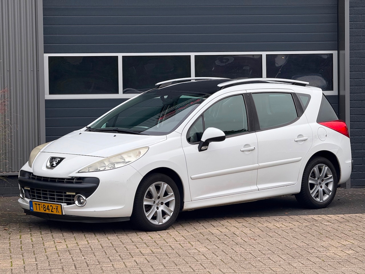 Peugeot 207 SW - 1.6 VTi X-line AUT|AIRCO - AutoWereld.nl