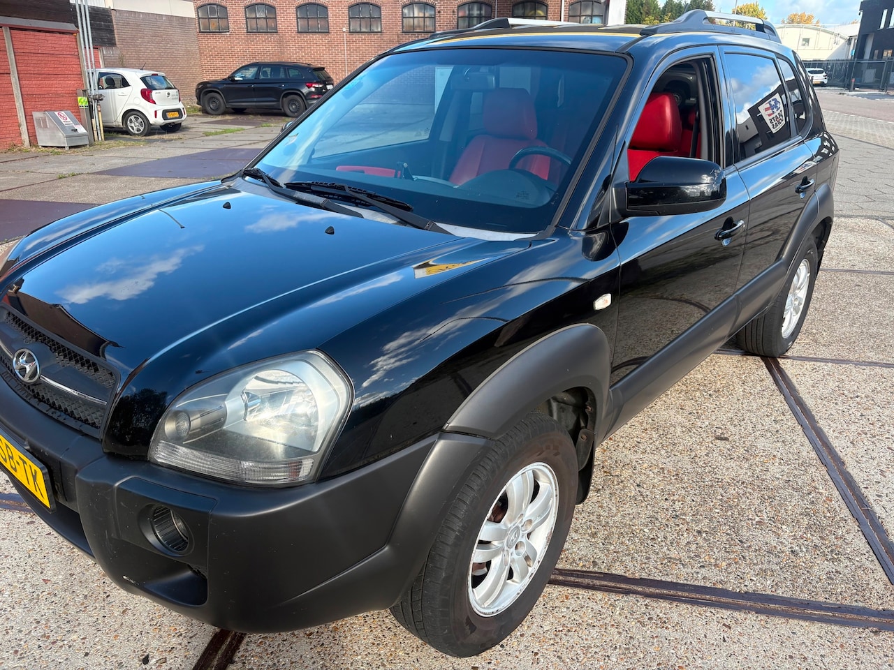 Hyundai Tucson - 2.0i Style 2.0i Style - AutoWereld.nl
