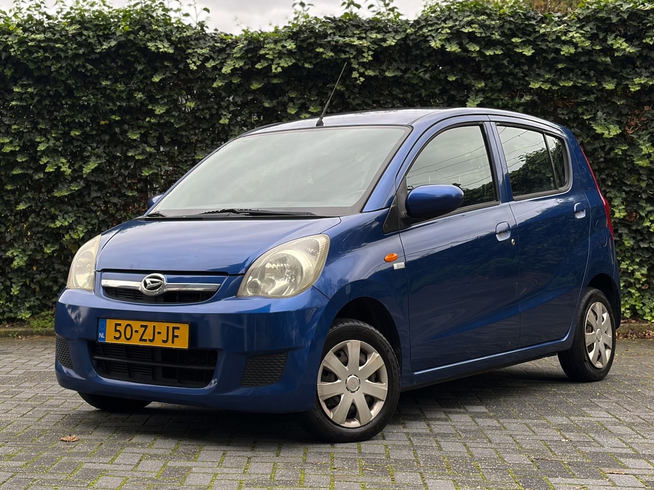 Daihatsu Cuore - 1.0 Premium | Nieuwe APK | NAP - AutoWereld.nl