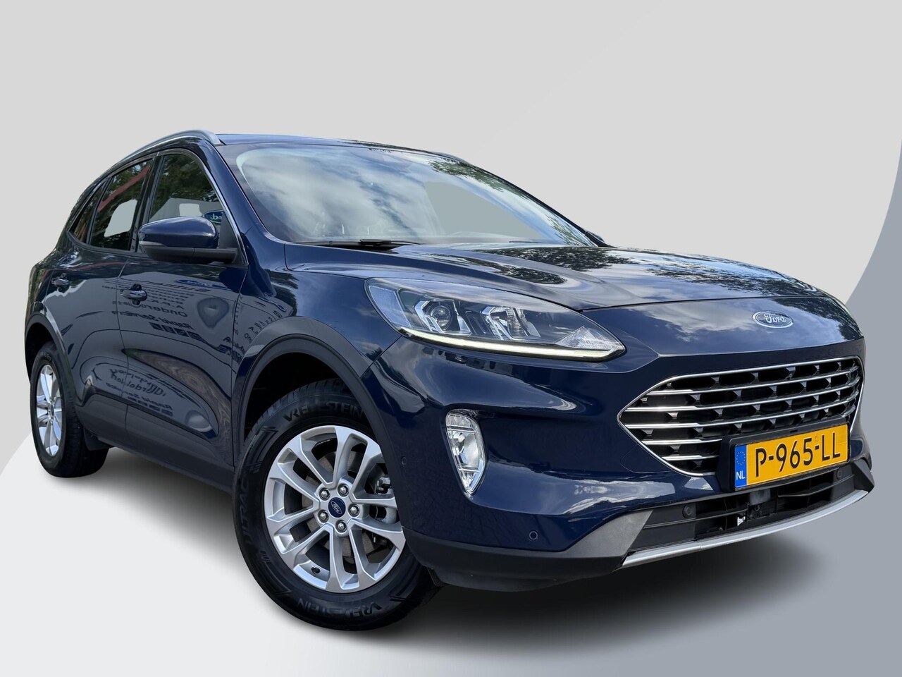 Ford Kuga - 2.5 PHEV Titanium | 225pk | Adaptive cruise control | Winter Pack | Dodehoeksensoren | Cam - AutoWereld.nl