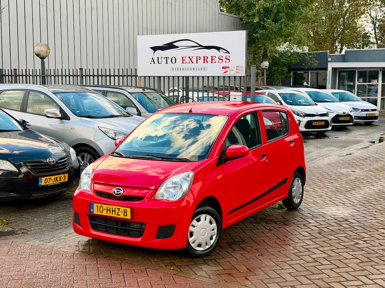 Daihatsu Cuore - 1.0 Trend Aut/stuurbekrachtiging/1E Eigenaar/Nap/Nieuw Apk/6 Maanden Garantie - AutoWereld.nl