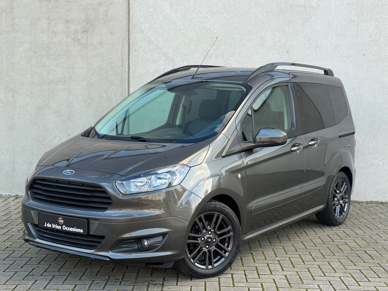 Ford Tourneo Courier - 1.0 ST LINE NAV STL VERW PDC CRUISE - AutoWereld.nl