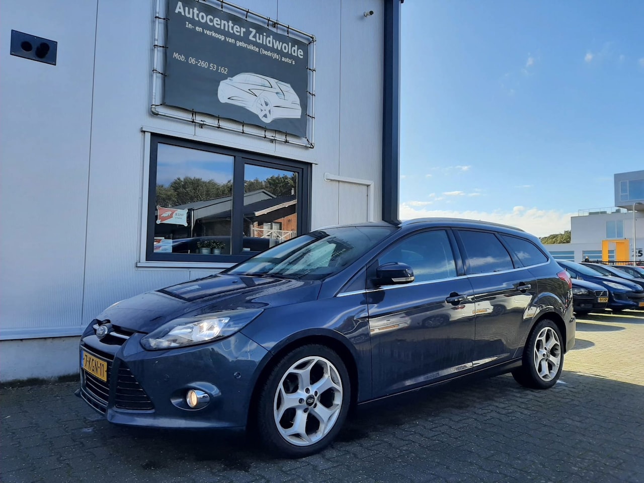 Ford Focus Wagon - 1.6 TDCI ECOnetic Lease Titanium clima cruise navi - AutoWereld.nl