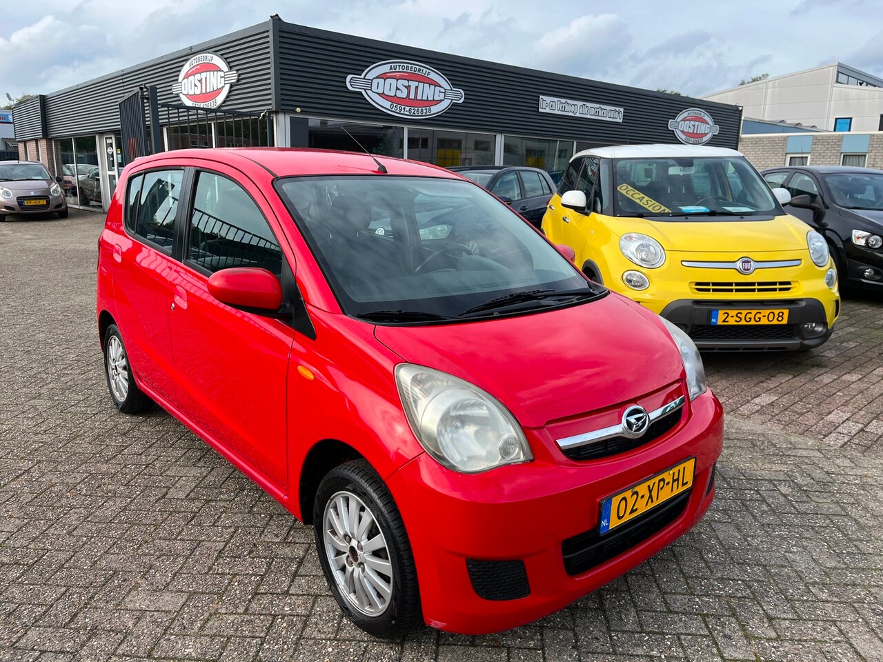 Daihatsu Cuore - 1.0 Premium(st-bekr,5drs,airco,elektr-pakket,bj07,1699,-) - AutoWereld.nl