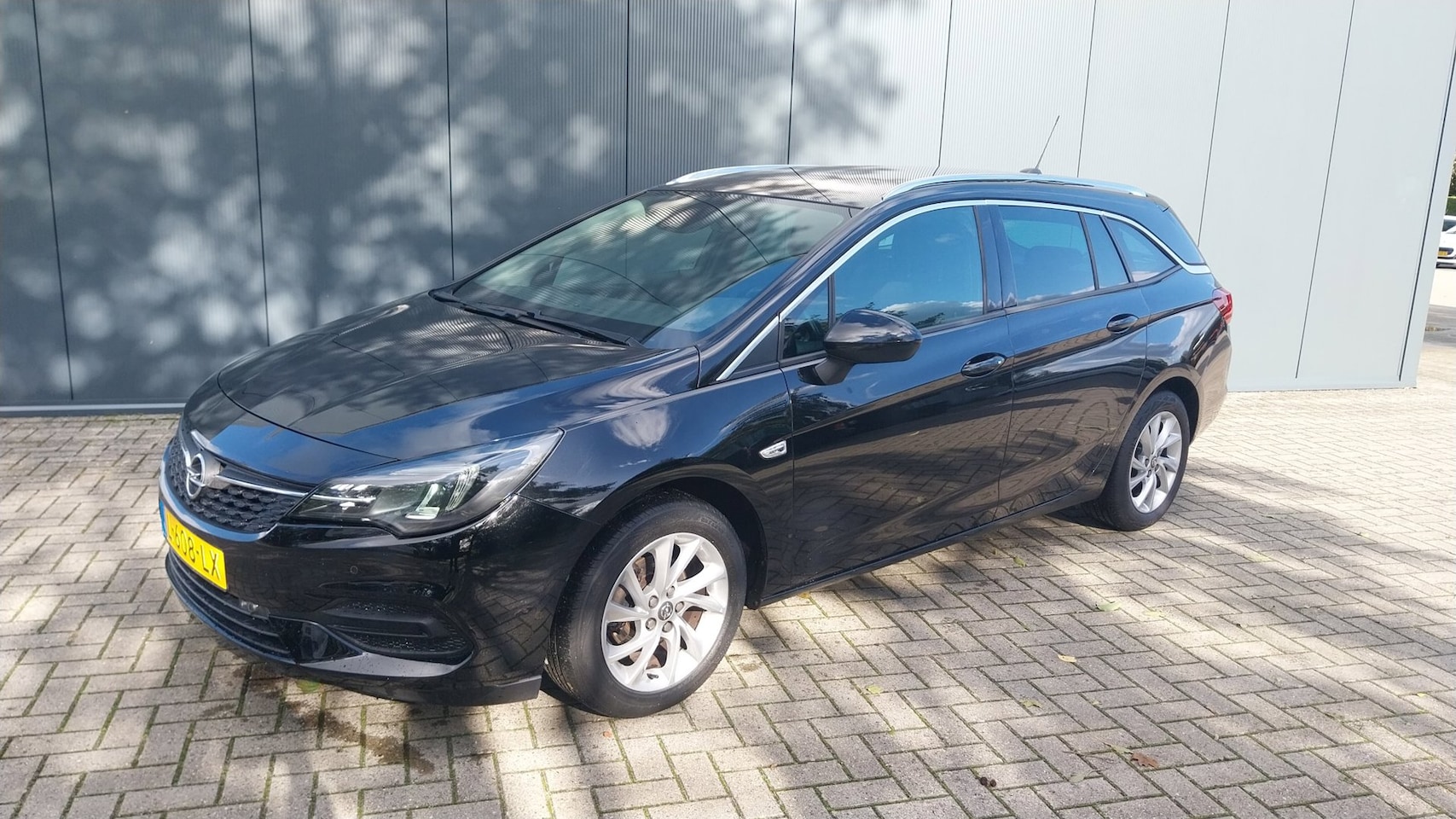 Opel Astra Sports Tourer - 1.2 Business Elegance 1.2 Business Elegance - AutoWereld.nl