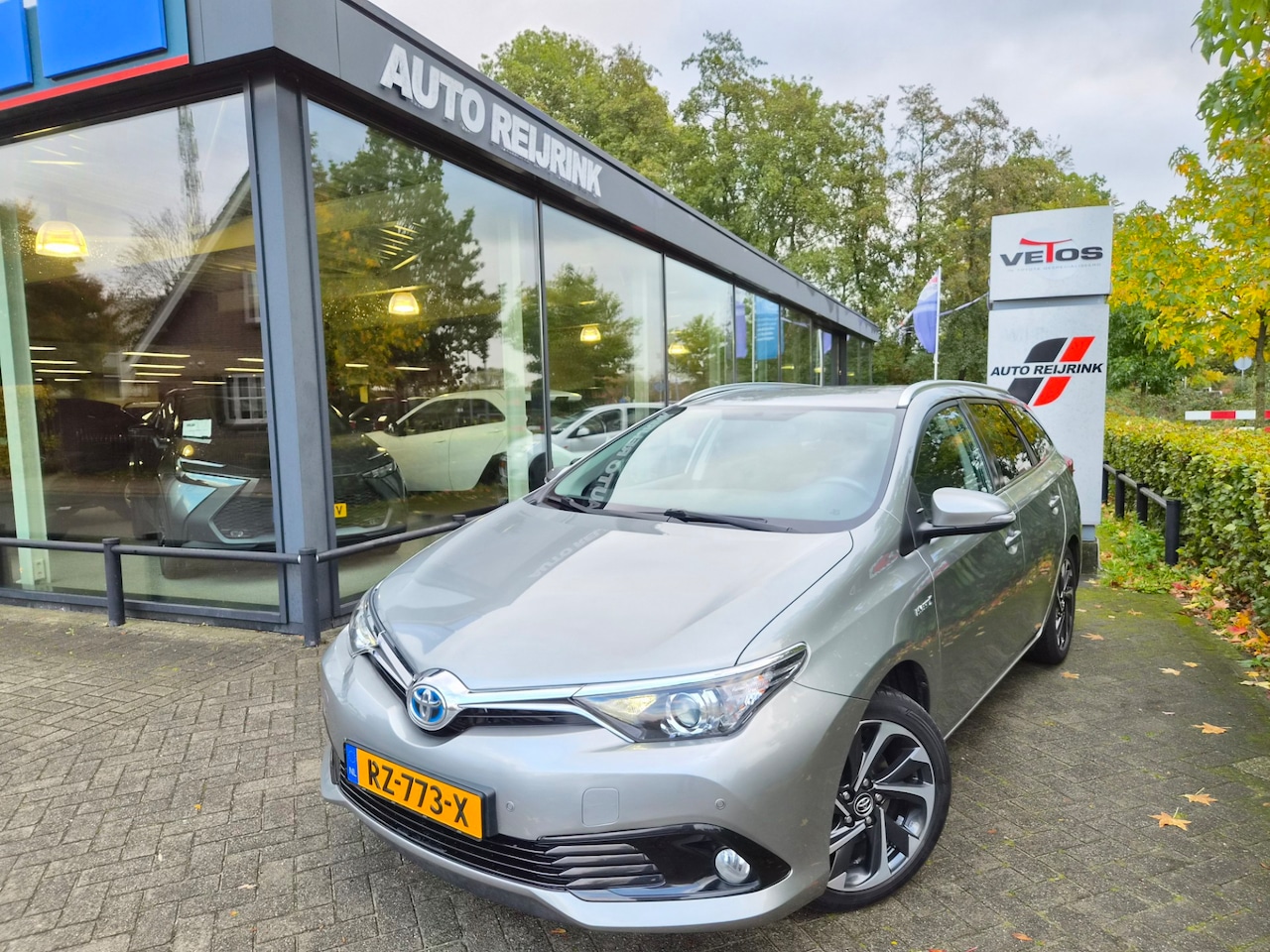 Toyota Auris Touring Sports - 1.8 Hybrid Lease Exclusive/TREKHAAK - AutoWereld.nl