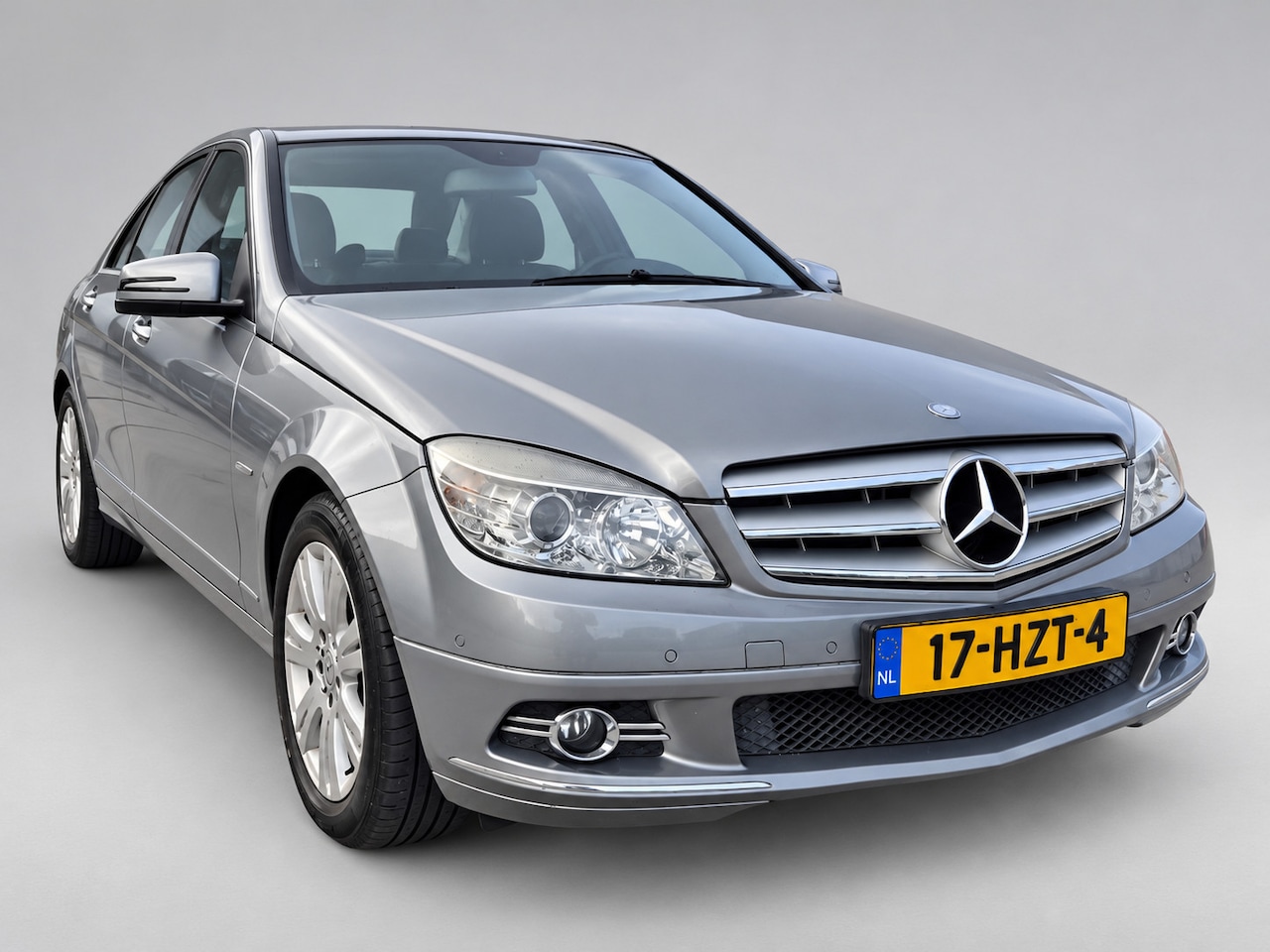 Mercedes-Benz C-klasse - 180 K BlueEFFICIENCY Business Edition Avantgarde - Clima - Navi - PDC - Trekhaak - RIjklaa - AutoWereld.nl