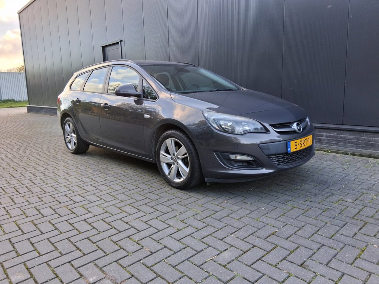 Opel Astra Sports Tourer - 1.4 Turbo Edition station / 158930 k.m. - AutoWereld.nl