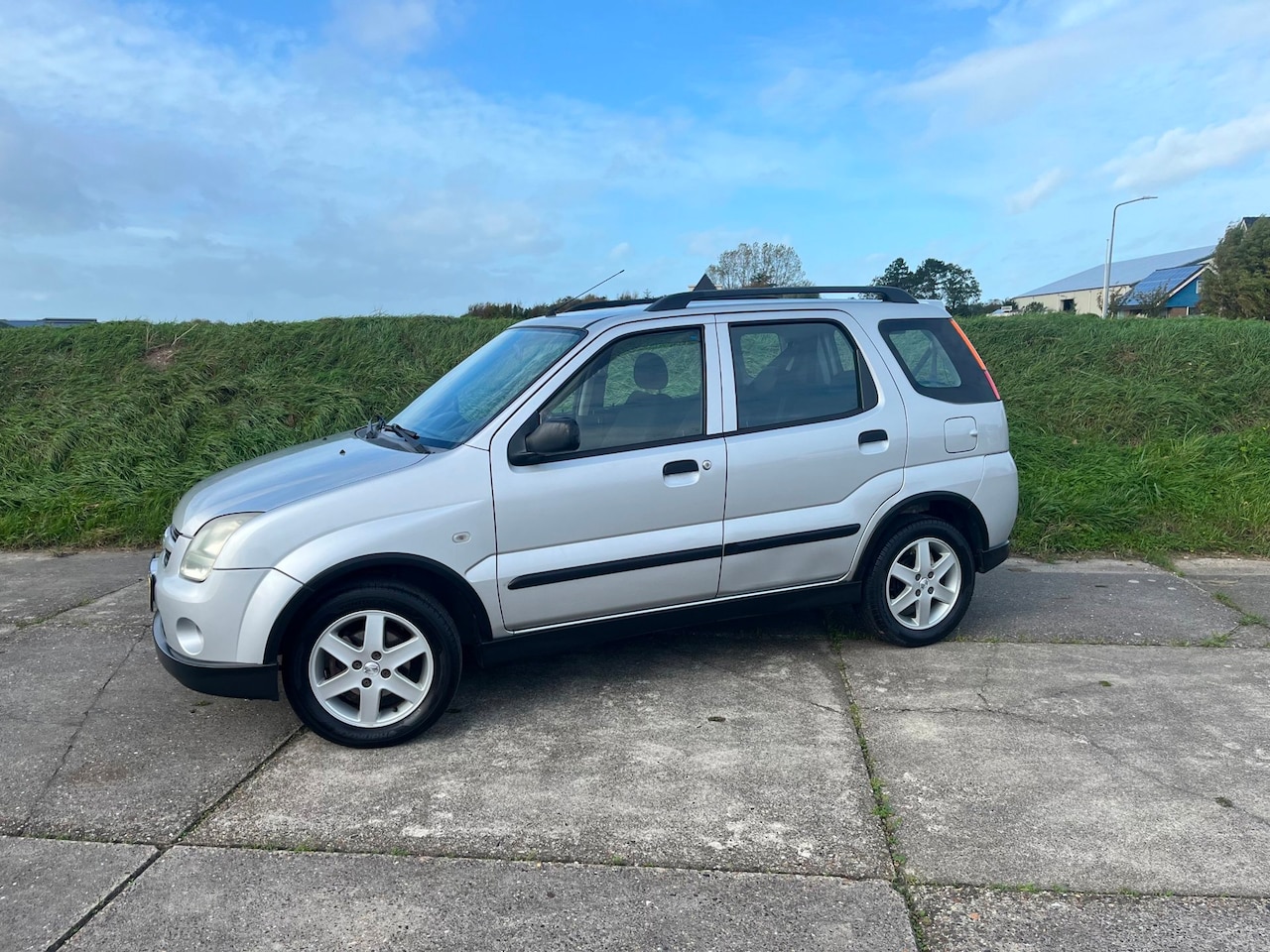 Suzuki Ignis - 1.5-16V Sport Exclusive Airco - AutoWereld.nl