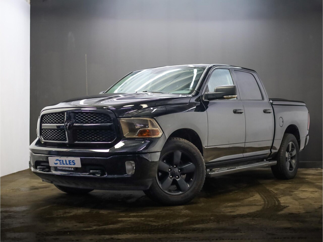 Dodge Ram 1500 - 3.6 V6 Crew Cab 5'7 | LPG | Schuif-/kantel dak | 4x4 | Stoelverwarming - AutoWereld.nl