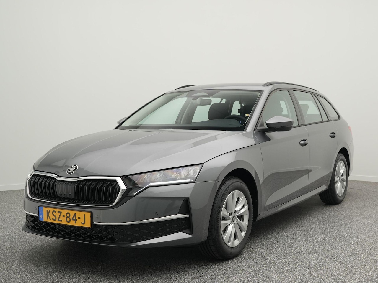 Skoda Octavia Combi - 1.5 TSI 115pk Business Edition | Trekhaak | Cruise control | Achteruitrijcamera | Apple Ca - AutoWereld.nl