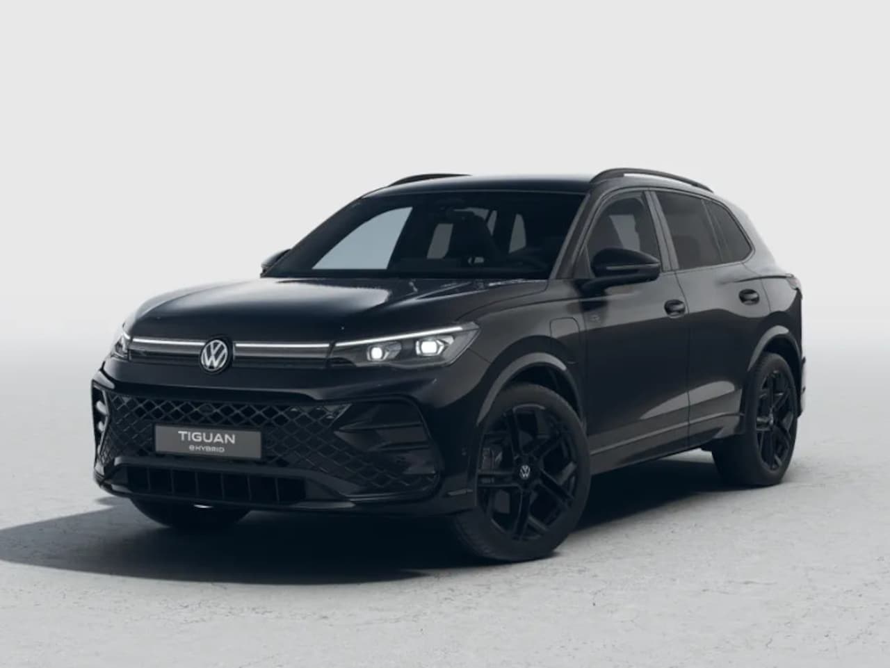Volkswagen Tiguan - R-Line Edition 1.5 eHybrid 272 PK 6 versn. DSG · Black Style Pakket · Interieur Style Pakk - AutoWereld.nl