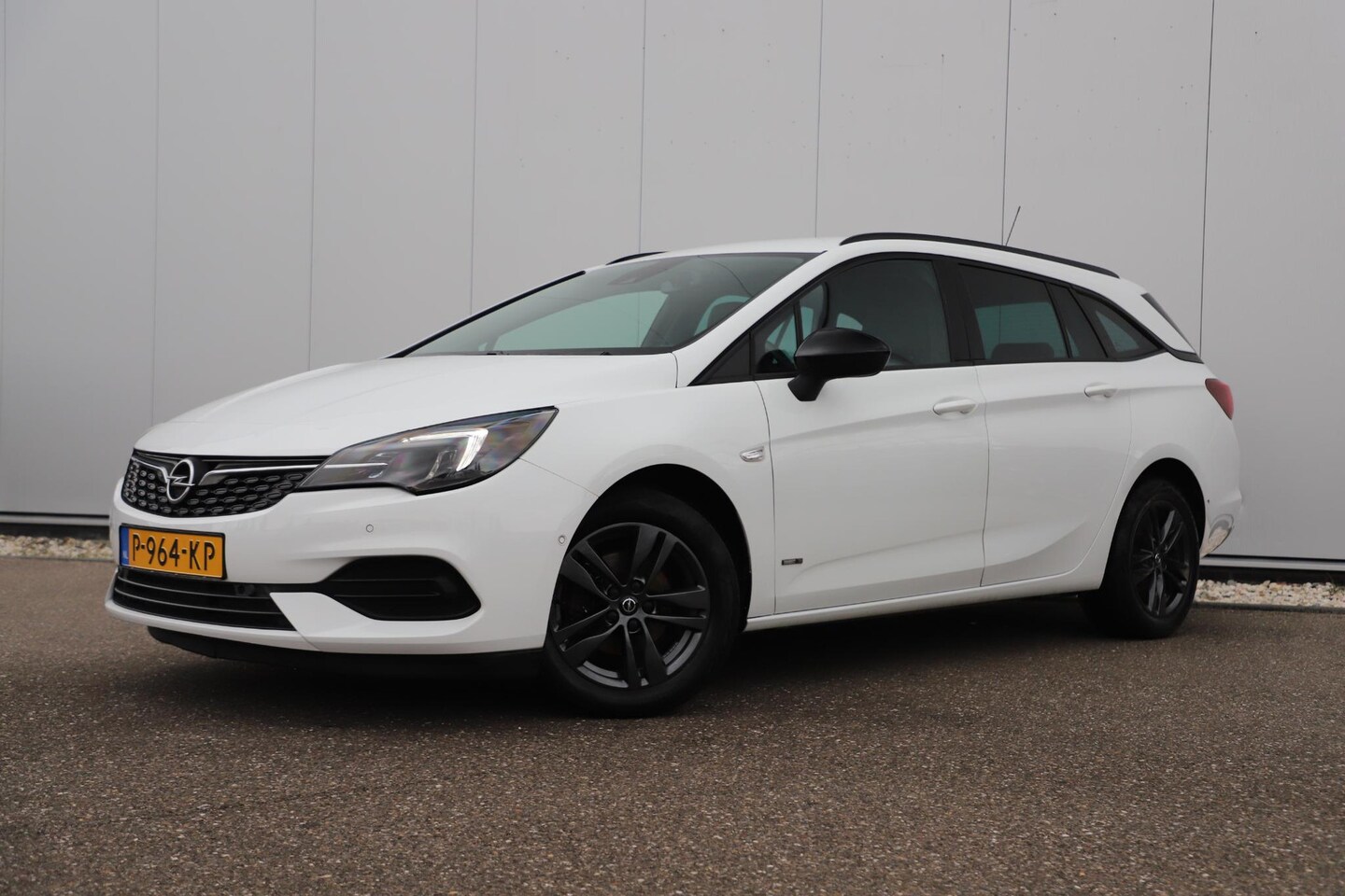 Opel Astra Sports Tourer - 1.2 Design & Tech 110PK Navigatie Achteruitrijcamera Clima Cruise Parkeersensor Carplay an - AutoWereld.nl