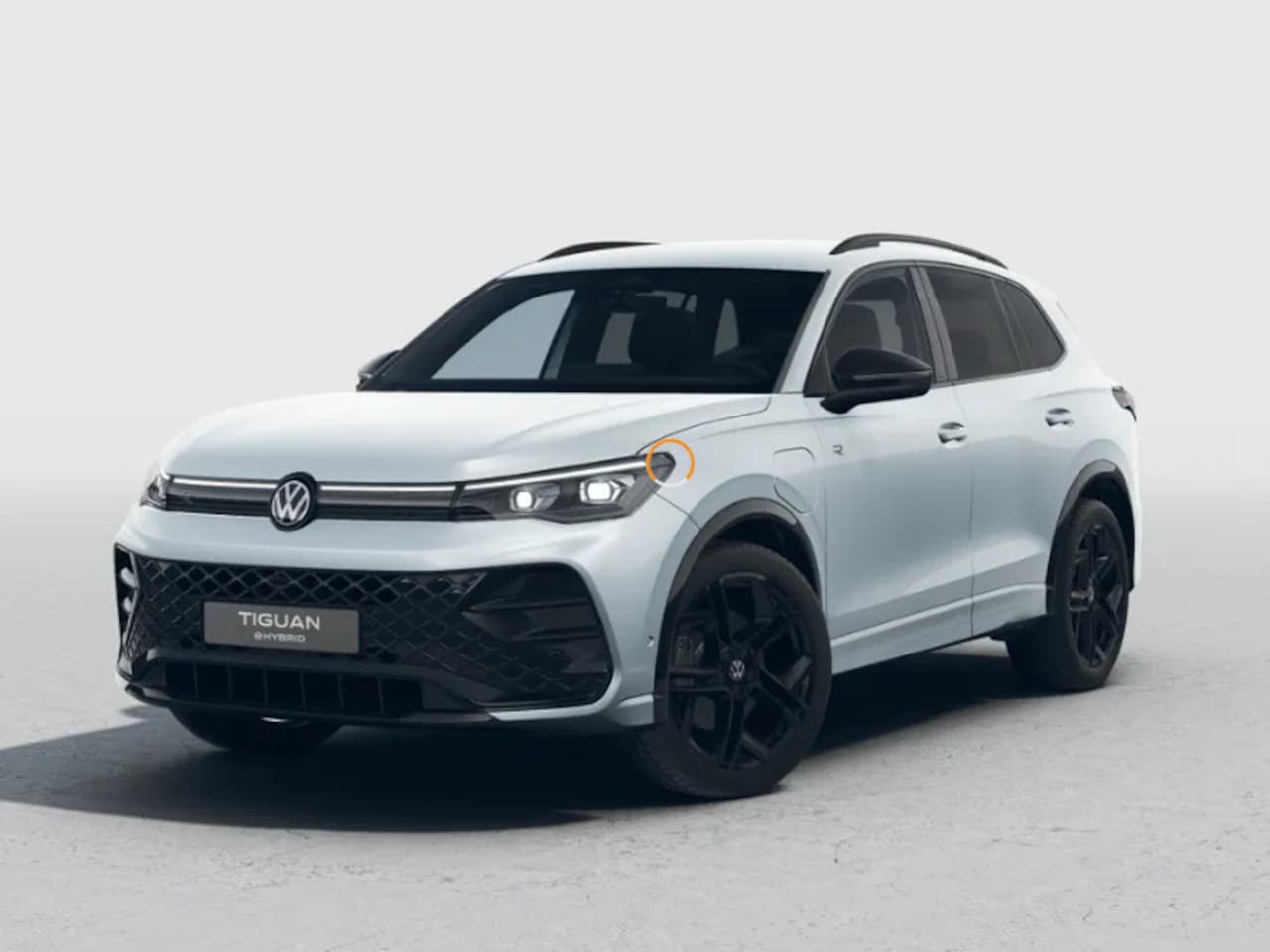 Volkswagen Tiguan - R-Line Edition 1.5 eHybrid 272 PK 6 versn. DSG · Black Style Pakket · Comfort Pakket Plus - AutoWereld.nl