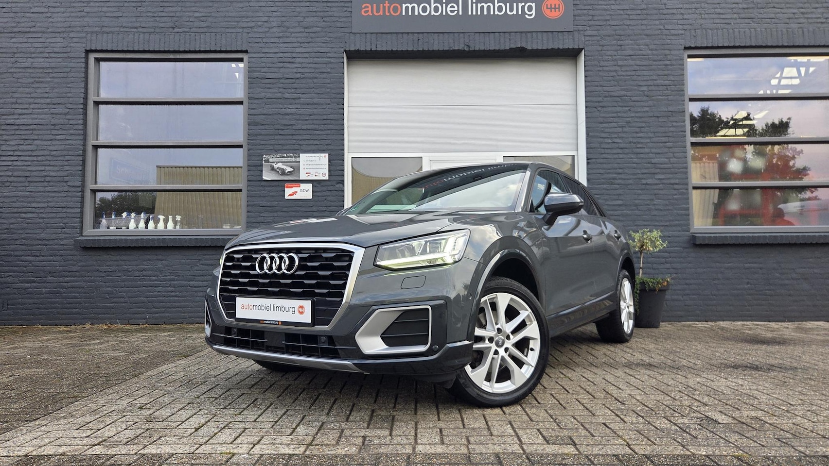 Audi Q2 - 1.0 TFSI Design Ultra | AUTOMAAT | NANOGRIJS | VEEL OPTIES | VOLLEDIGE ONDERHOUDSHISTORIE - AutoWereld.nl