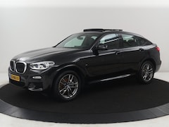 BMW X4 - xDrive20i High Executive Edition M-sport | Panoramadak | Leder | Trekhaak | Camera | Sfeer