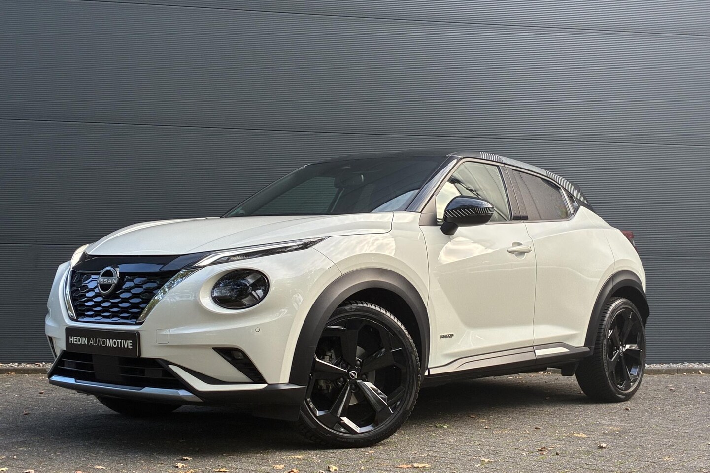 Nissan Juke - 1.6 Hybrid Premiere Edition | Leder | Stoelverwarming | Navigatie | Camera | Sensoren | Cr - AutoWereld.nl
