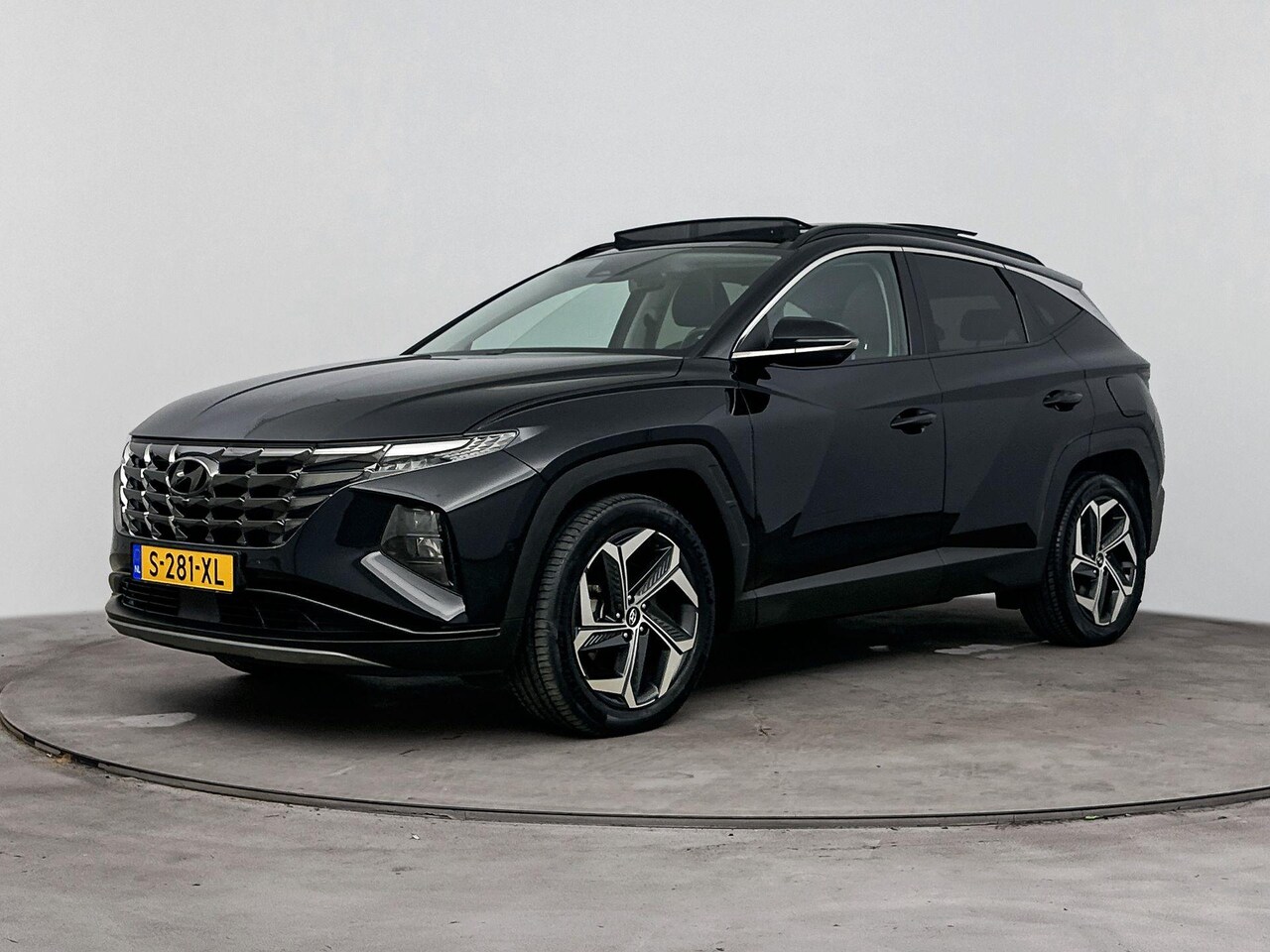 Hyundai Tucson - 1.6 T-GDI HEV Premium Sky | Stoel & stuurverwarming | schuif kanteldak | Achteruitrij came - AutoWereld.nl