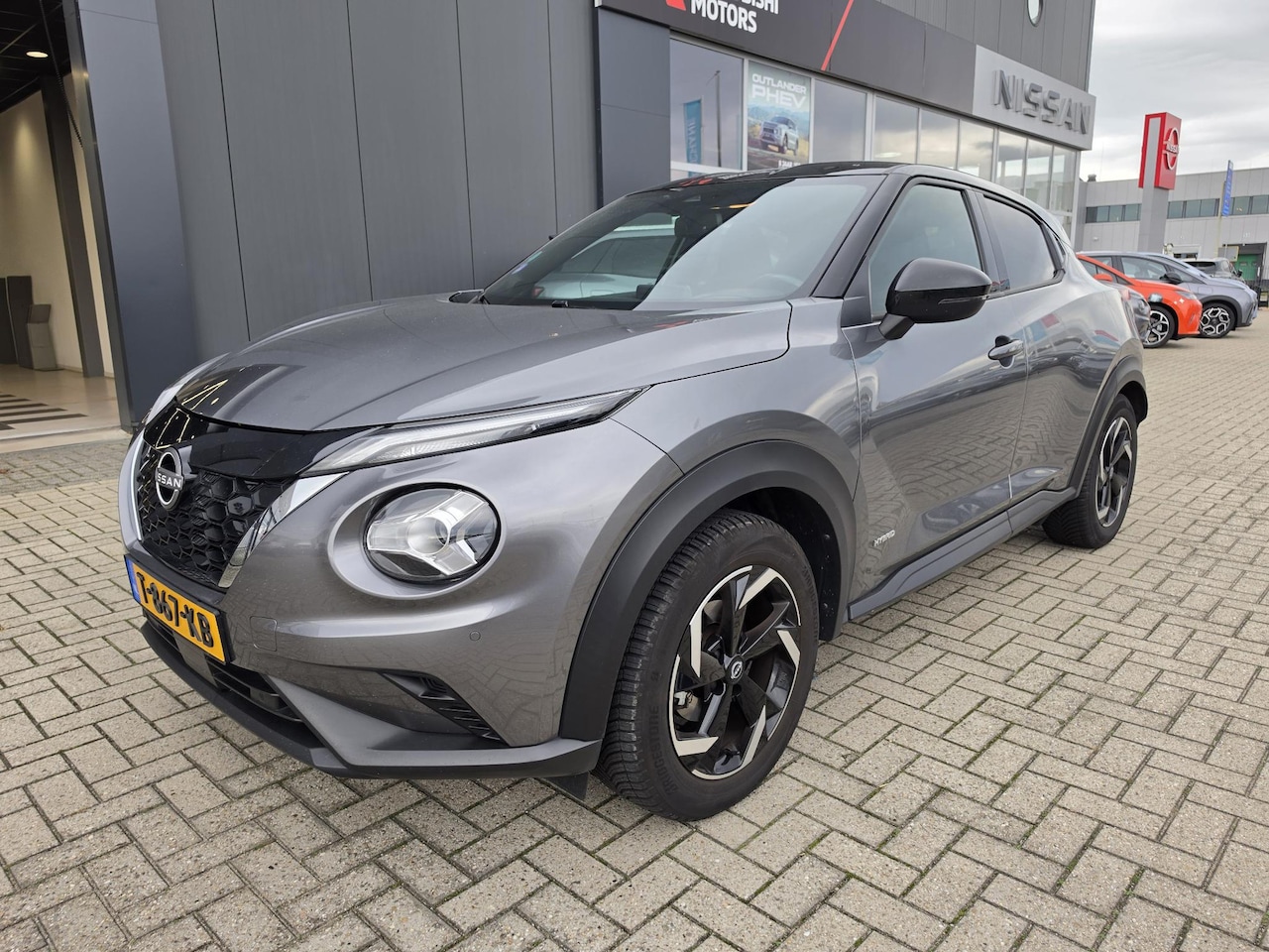 Nissan Juke - 1.6 Hybrid N-Connecta | Apple CarPlay / Android Auto navigatie | Camera | Climate Control - AutoWereld.nl