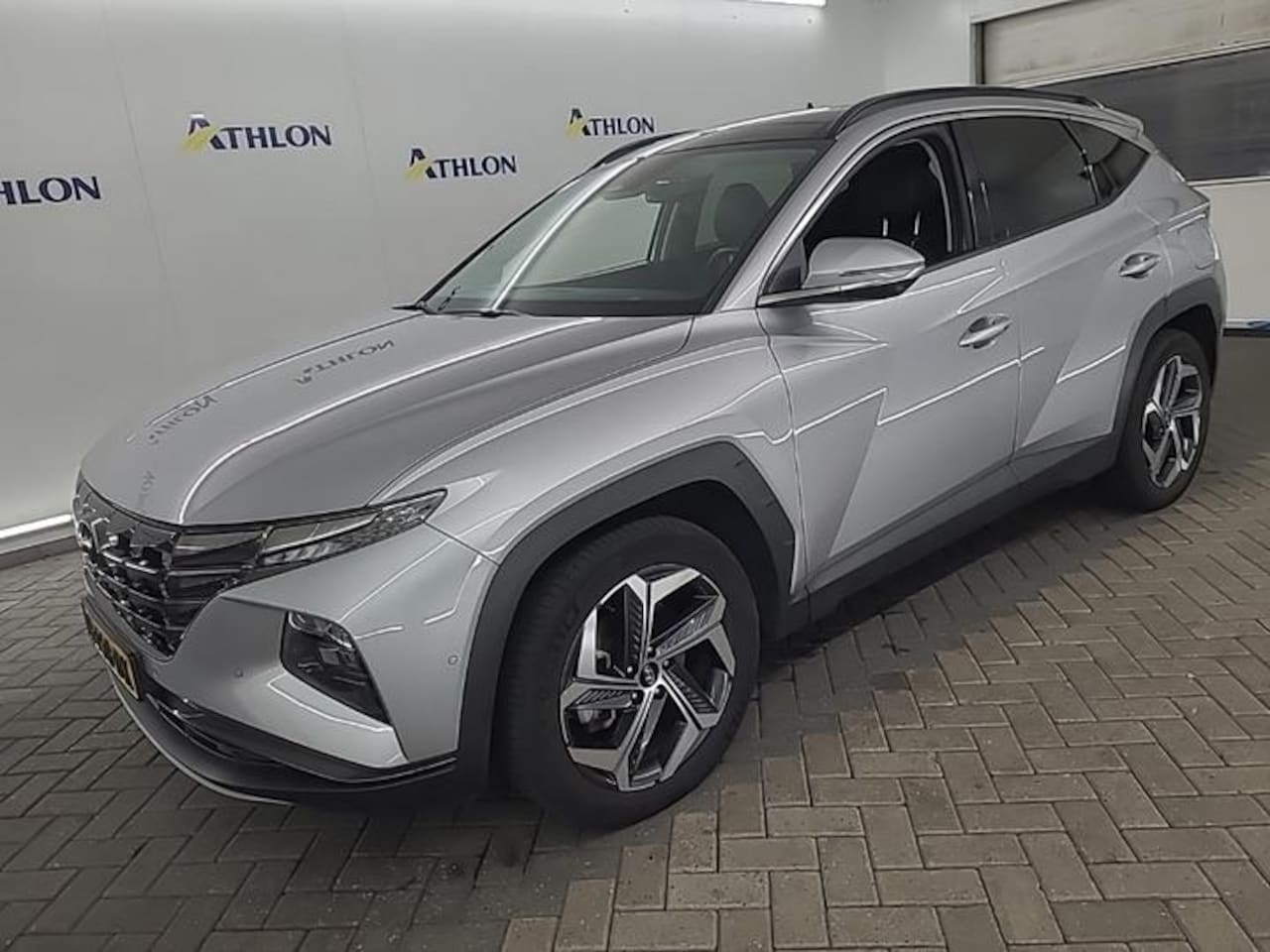 Hyundai Tucson - 1.6 T-GDI PHEV PREMIUM SKY 4WD I AUTOMAAT I SCHUIF/KANTELDAK I 360 CAMERA I APPLE CARPLAY - AutoWereld.nl