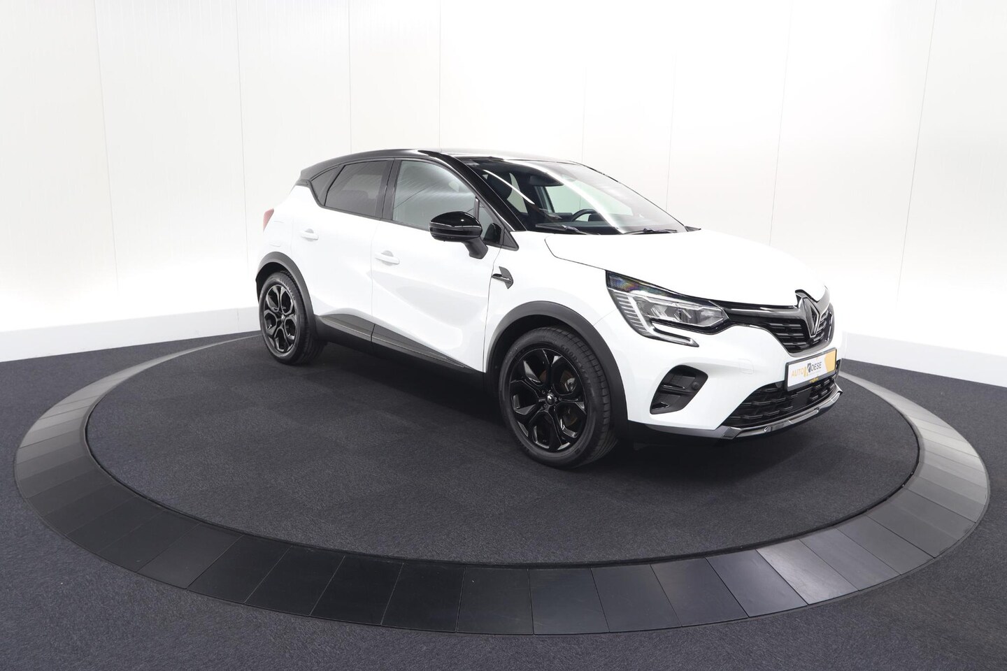 Renault Captur - 1.6 E-Tech hybrid 145 SL Rive Gauche | Trekhaak | Camera | Apple Carplay | 9.3 Inch Groots - AutoWereld.nl