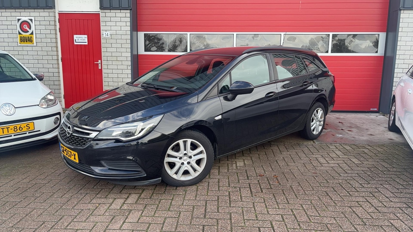 Opel Astra Sports Tourer - 1.0 Online Edition TREKHAAK / CARPLAY / AIRCO / PDC / BLUETOOTH / CRUISE / NL-AUTO - AutoWereld.nl