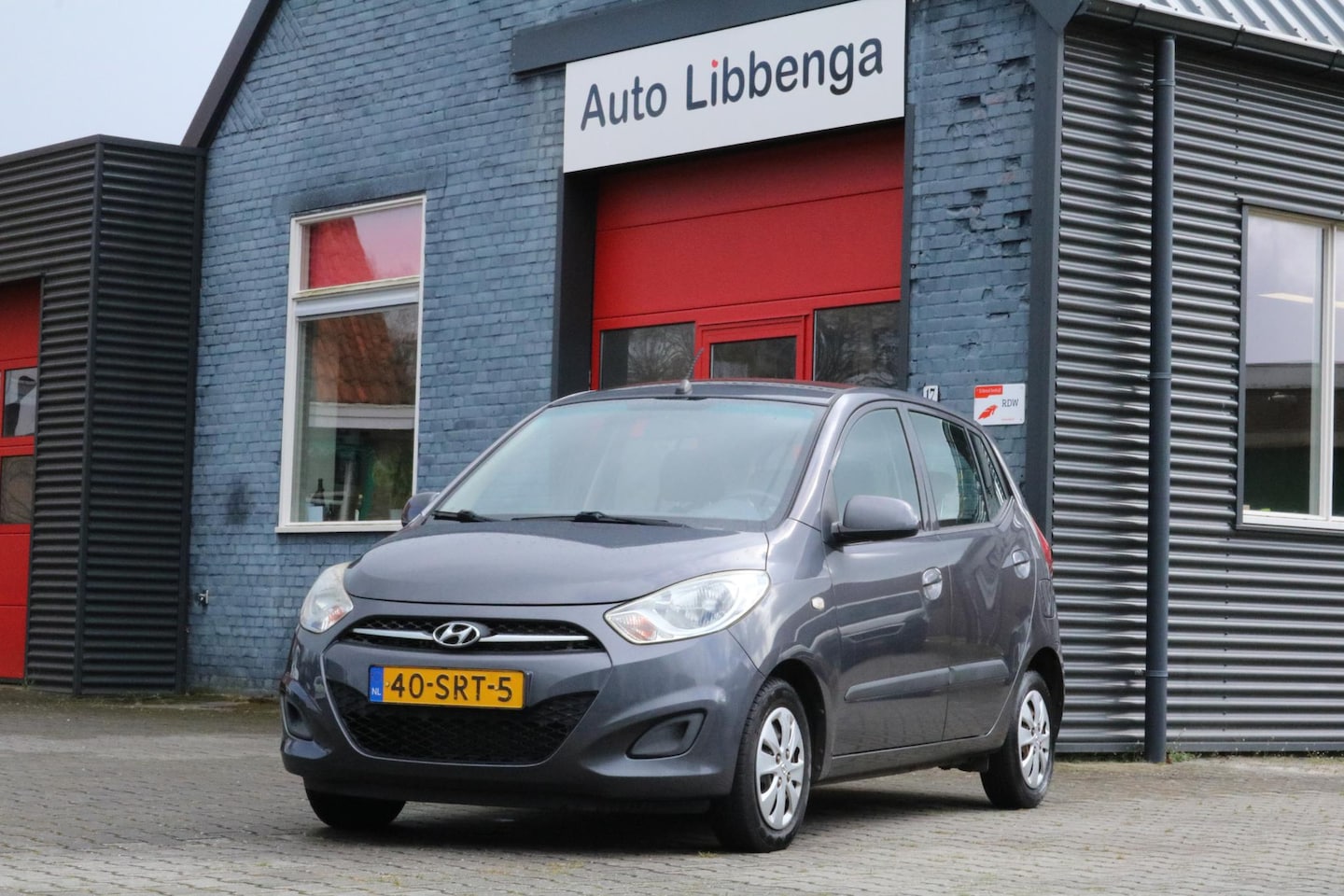 Hyundai i10 - 1.1 i-Drive Cool AIRCO / CENTR.VERGR. / METALLIC LAK / 84.000 KM!! - AutoWereld.nl