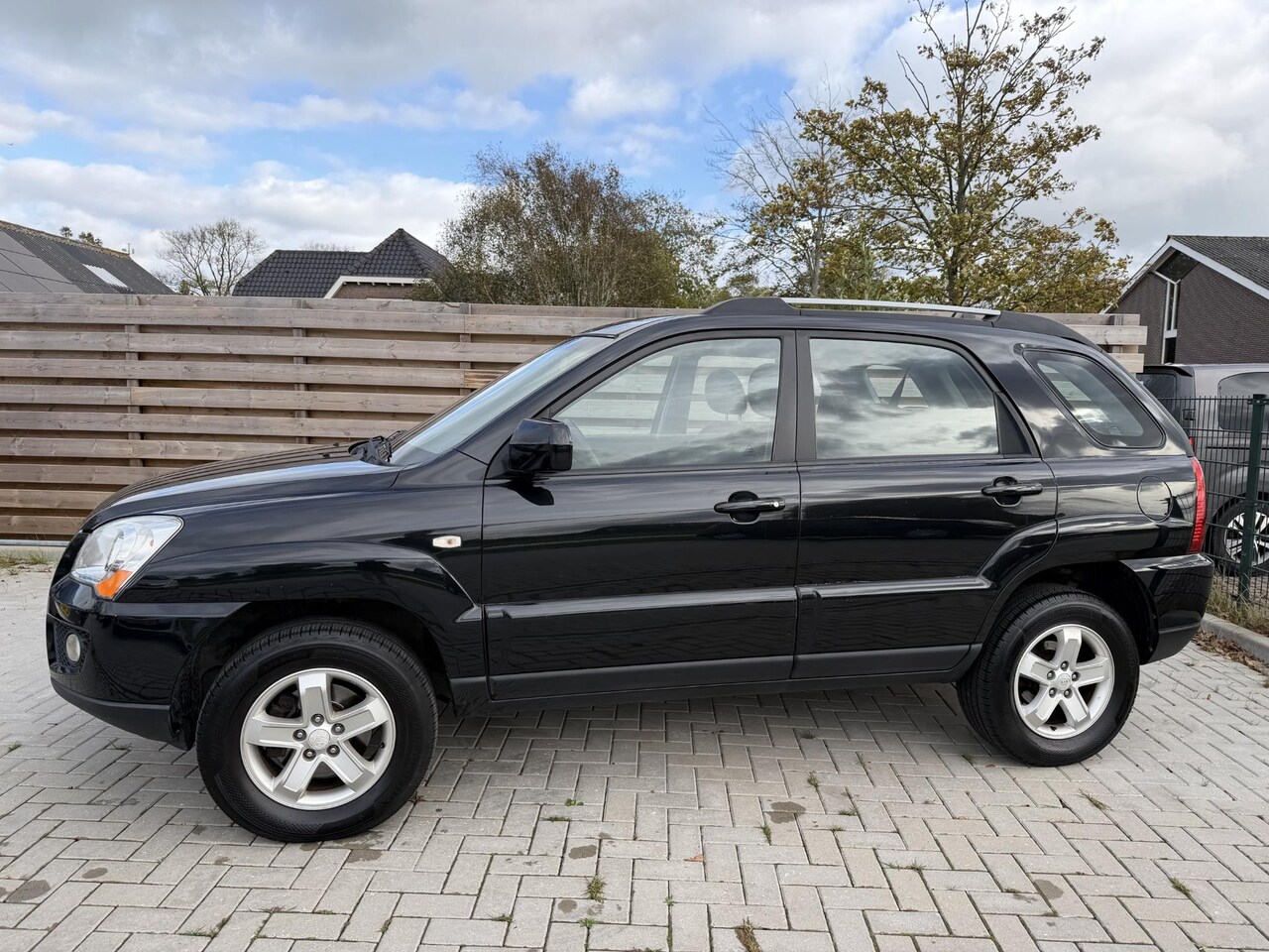 Kia Sportage - 2.0 CVVT X-pect 2.0 CVVT X-pect - AutoWereld.nl