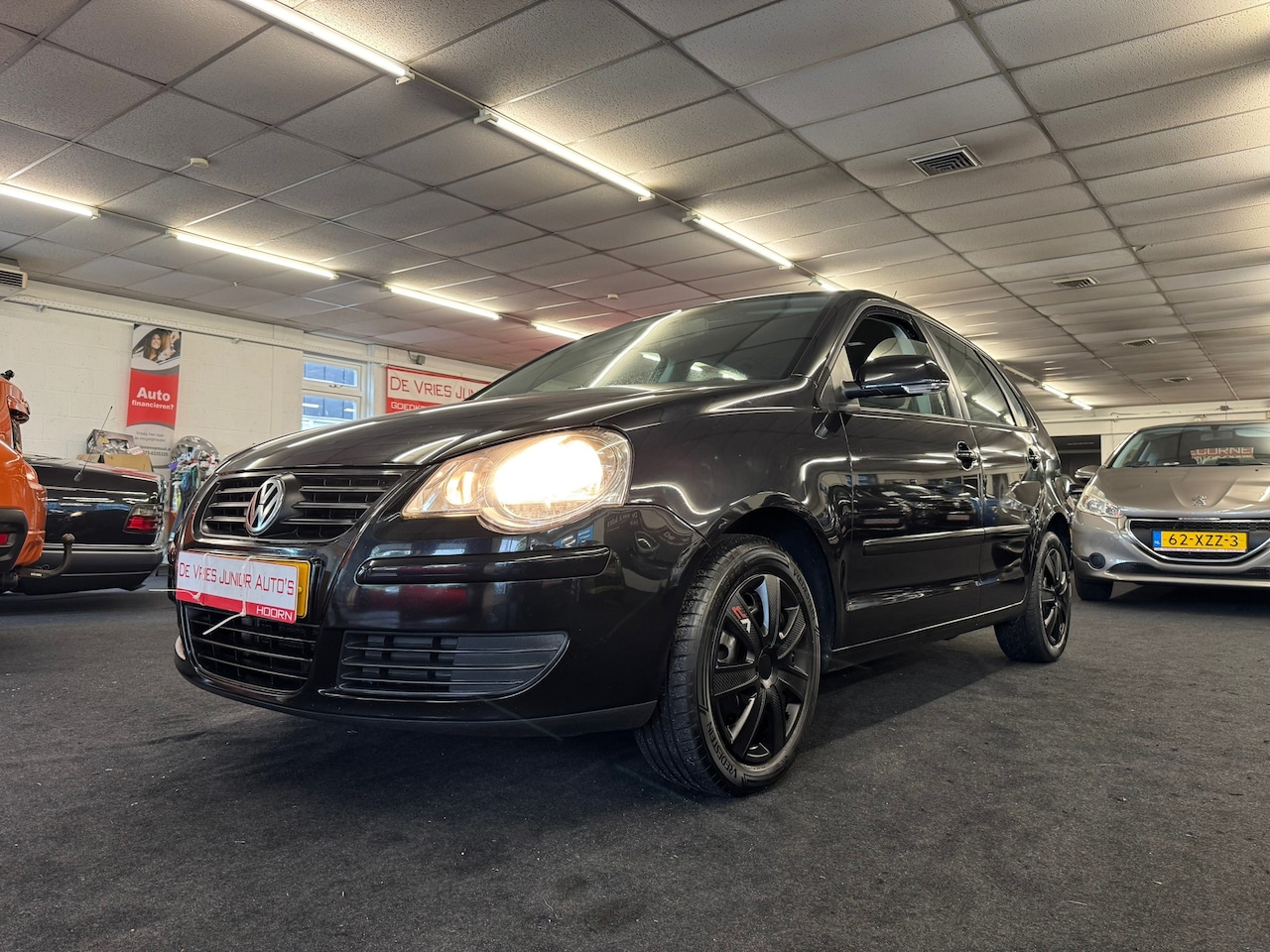 Volkswagen Polo - 1.4-16V Comfortline. Cruise control, airco, BT, trekhaak en meer! - AutoWereld.nl