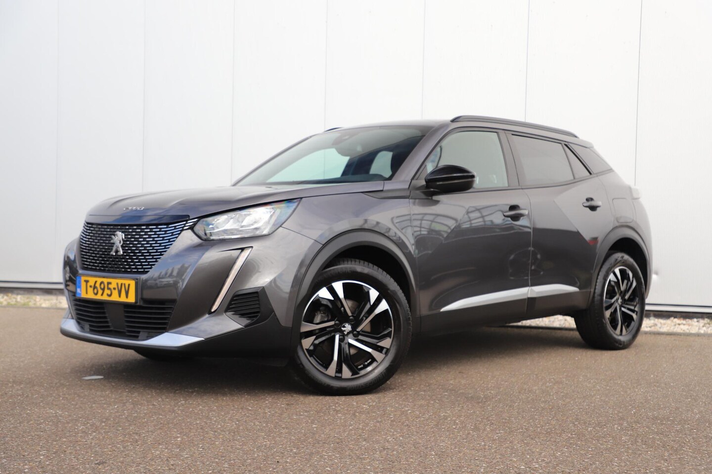 Peugeot 2008 - 1.2 PureTech Allure 102PK Half Leder Navigatie Carplay Android Climate Cruise Control LED - AutoWereld.nl
