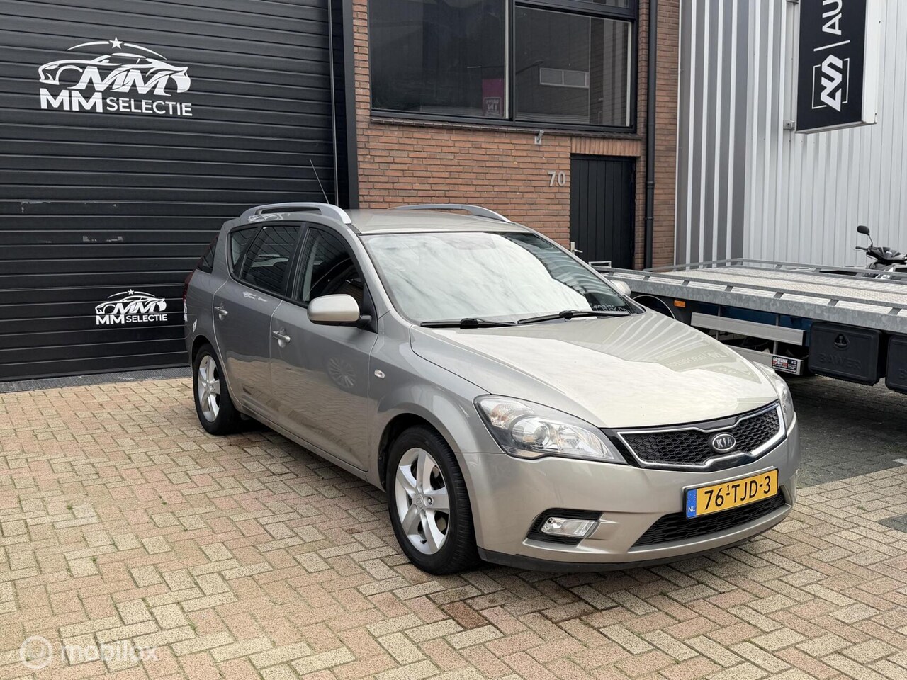 Kia Cee'd Sporty Wagon - 1.4 CVVT Navigator Plus Pack 1.4 CVVT Navigator Plus Pack - AutoWereld.nl