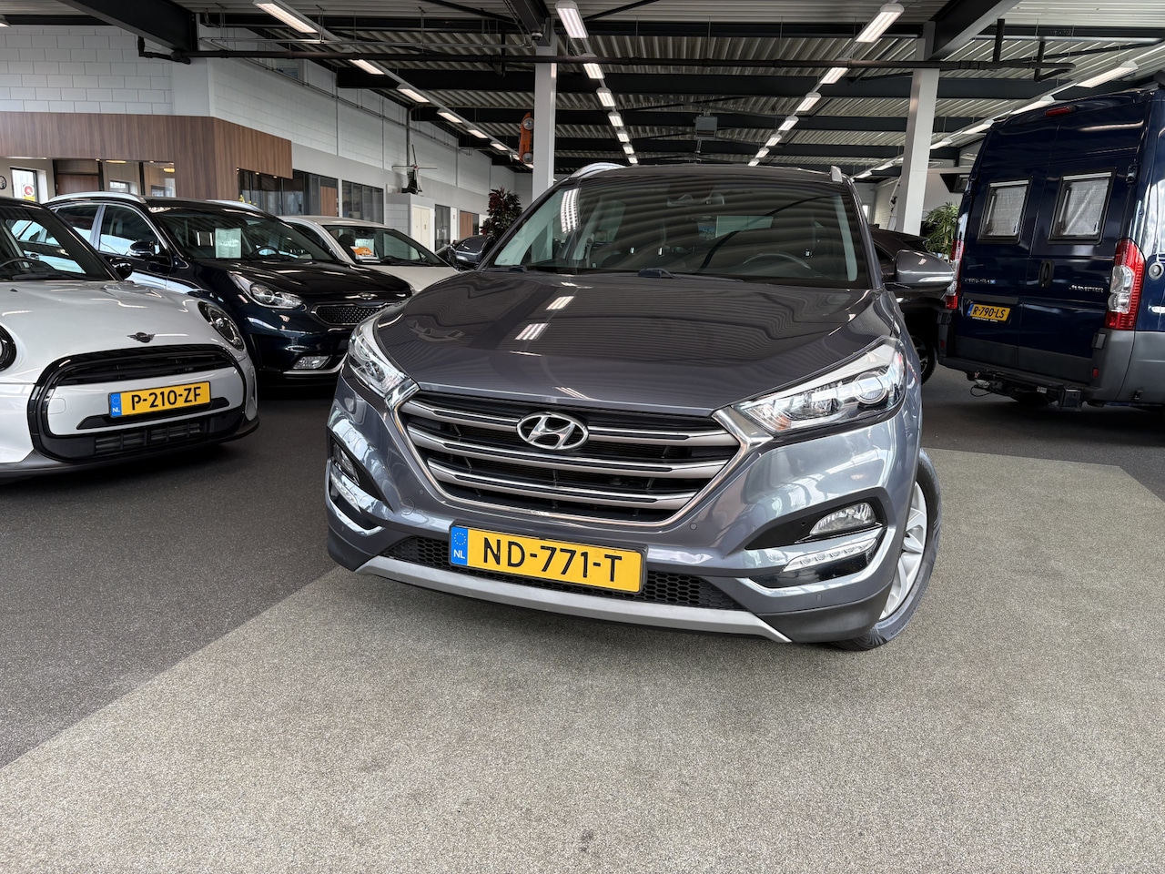 Hyundai Tucson - 1.6 GDi Comfort CAMERA/NAVI/CRUISE/PDC/TREKHAAK - AutoWereld.nl