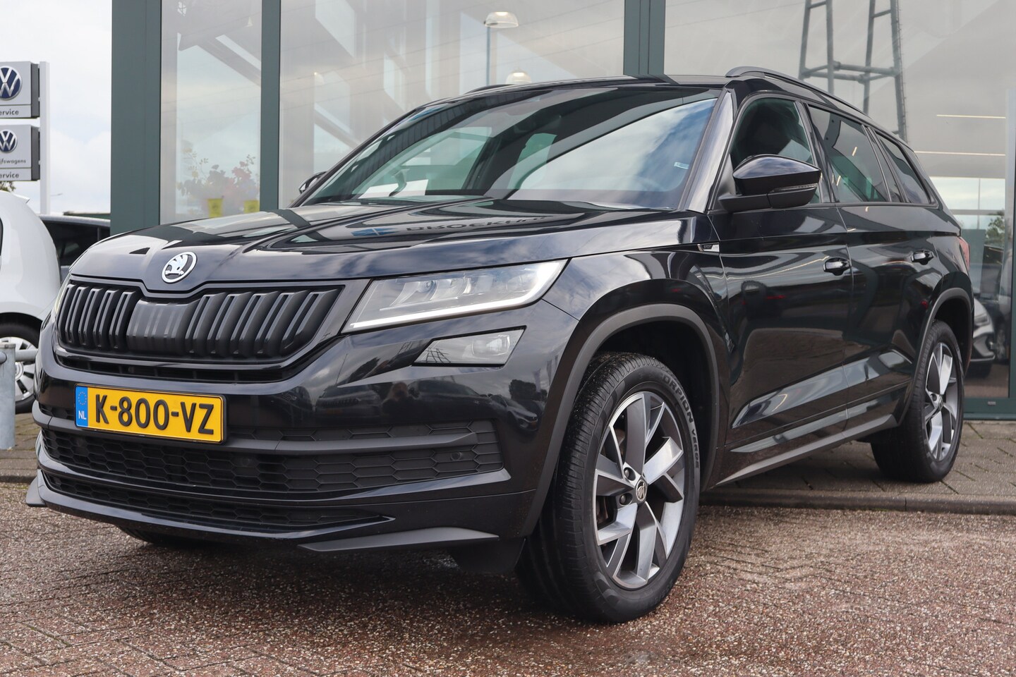 Skoda Kodiaq - 1.5 TSI Sportline Business 150PK TREKHAAK | Apple Carplay/Android Auto|telefoonintegratie - AutoWereld.nl