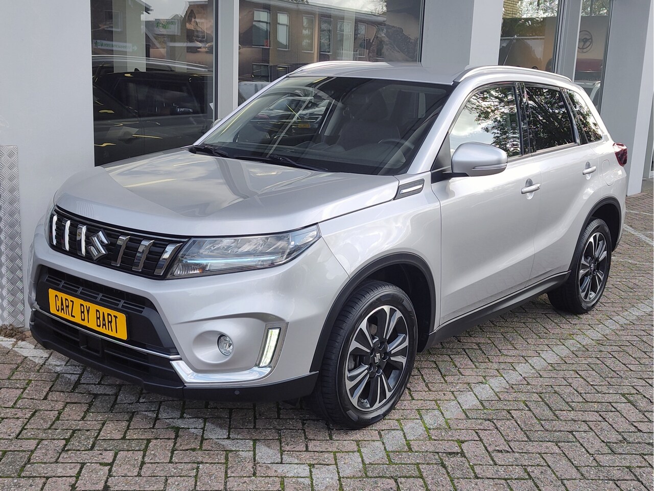 Suzuki Vitara - 1.5 HYBRID STYLE AUTOMAAT Keyless | Dodehoeksensoren | Navi | Adaptive Cruise - AutoWereld.nl