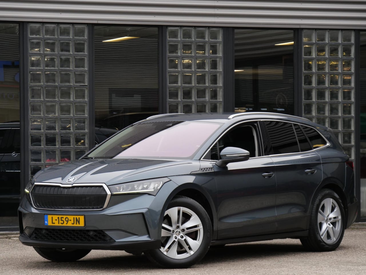 Skoda Enyaq iV - 80 LEER/ TREKHAAK/ ADAPTIVE CRUISE/ BLINDSPOT/ ELEKT. STOEL/ SOH 90% - AutoWereld.nl